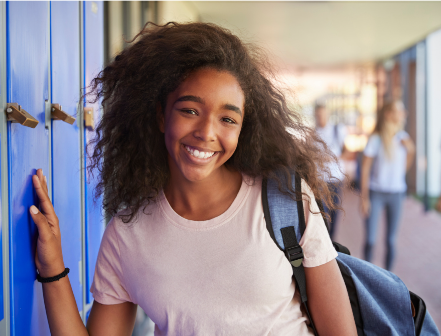 Happy teenager at school