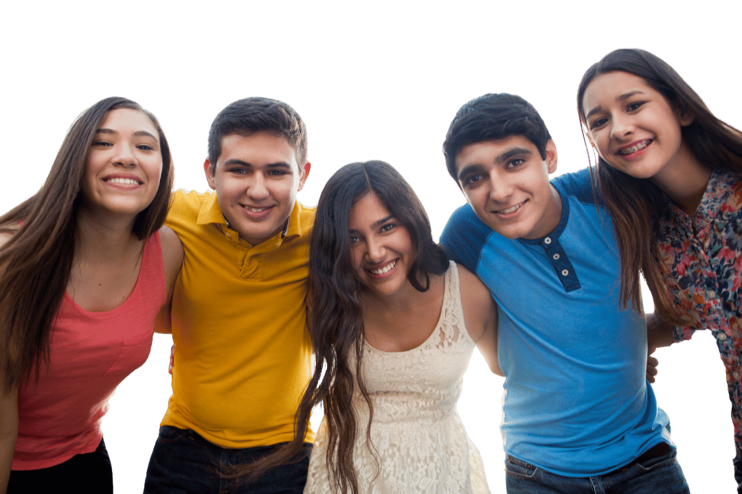 Teens smiling at a camera