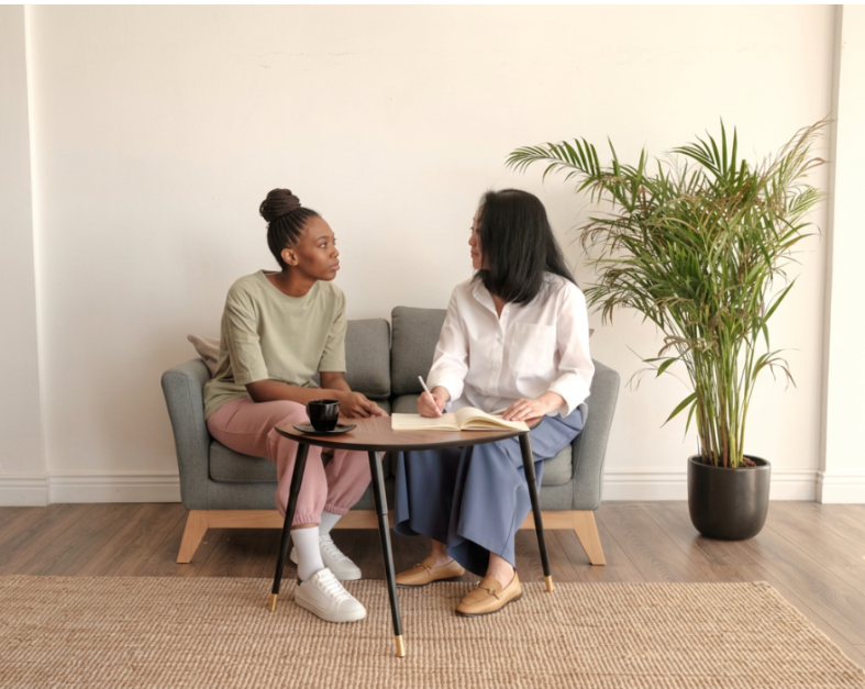 Two women talking in a therapy office