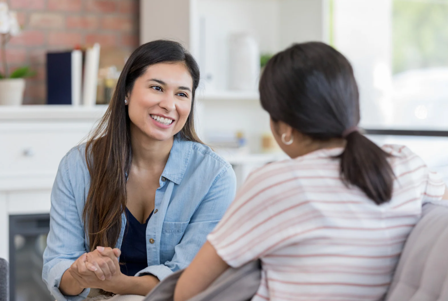 Two women talking