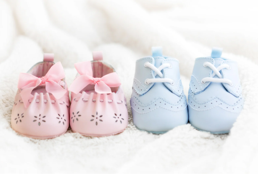 Pink and blue baby shoes
