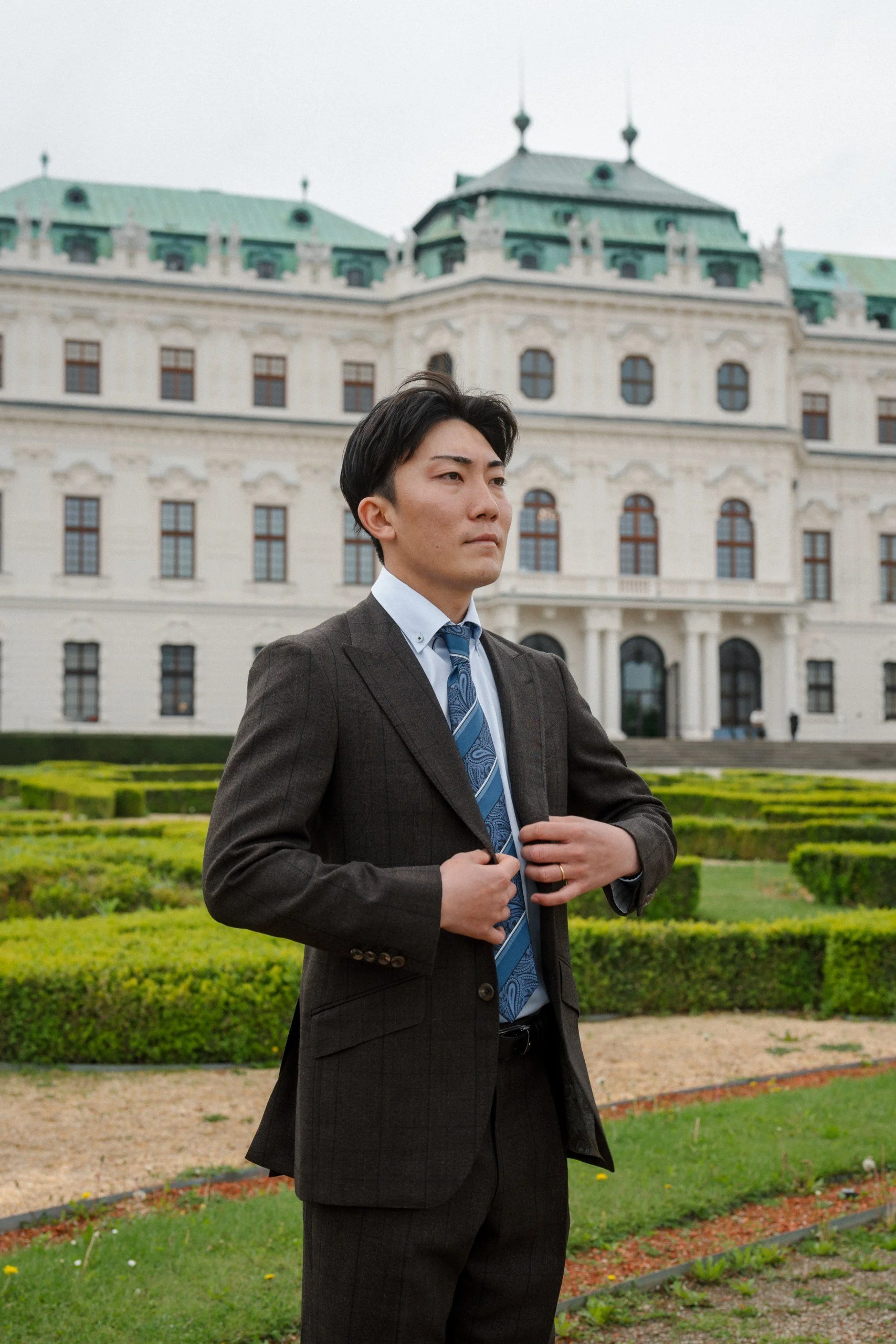 Groom portrait outdoor Belvedere Palace gardens Vienna elopement Fine Events Vienna