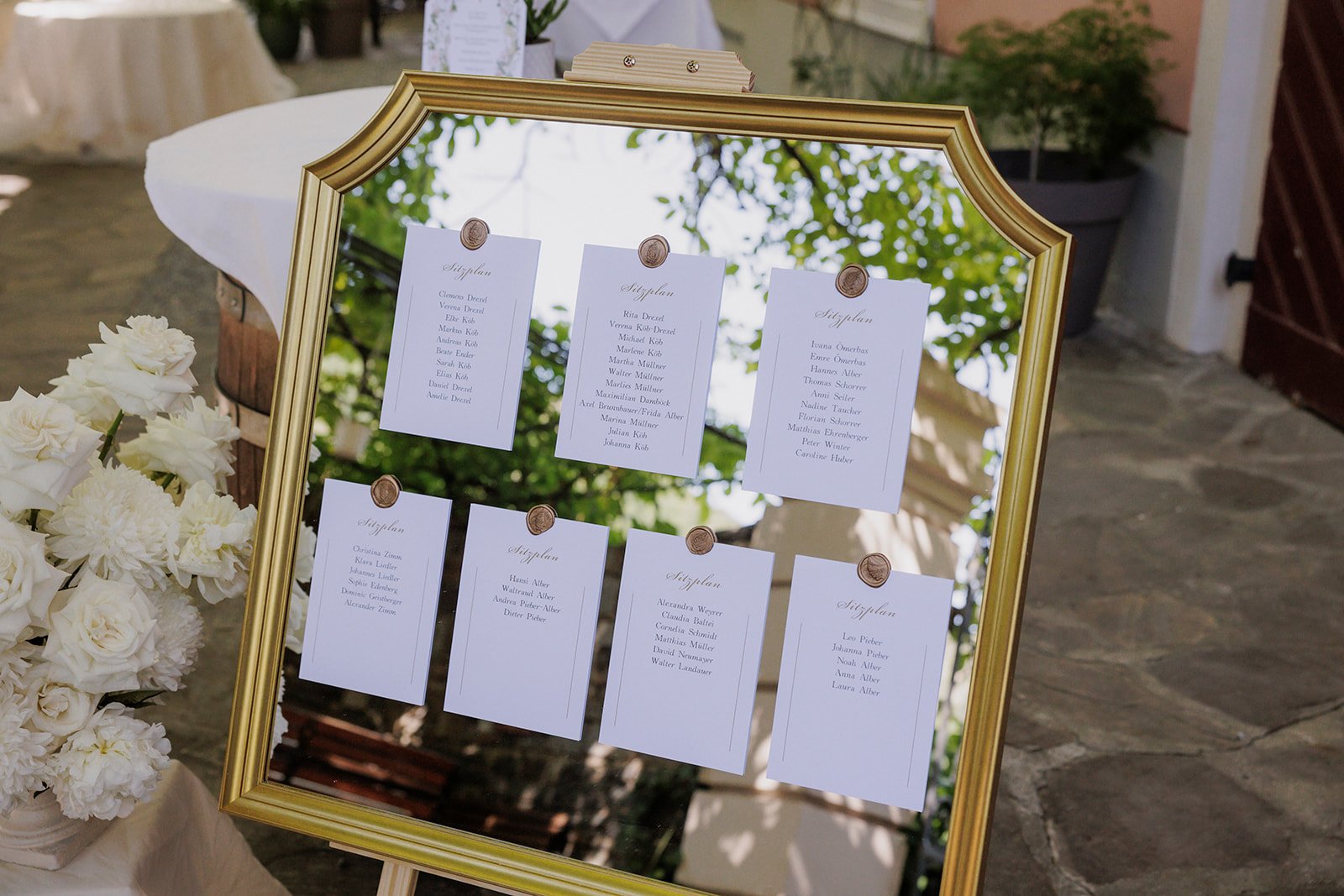 Wedding celebration seating plan mirror Wachau Austria wine region Fine Events Vienna