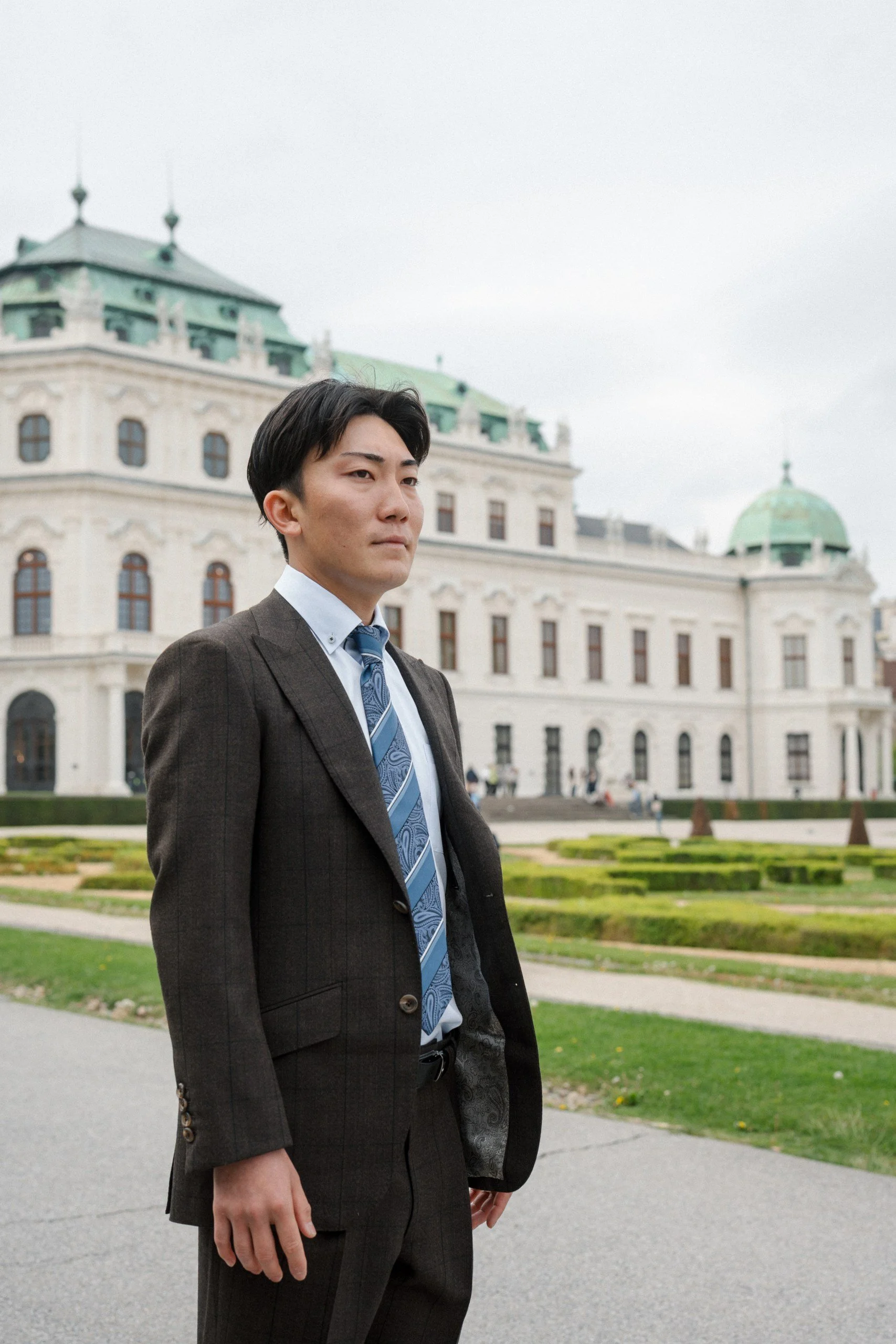 Elegant Japanese groom portrait Belvedere Palace Vienna Fine Events Vienna