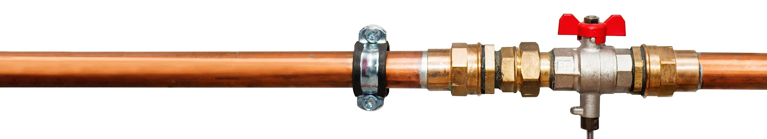 copper pipe with a red shut-off valve
