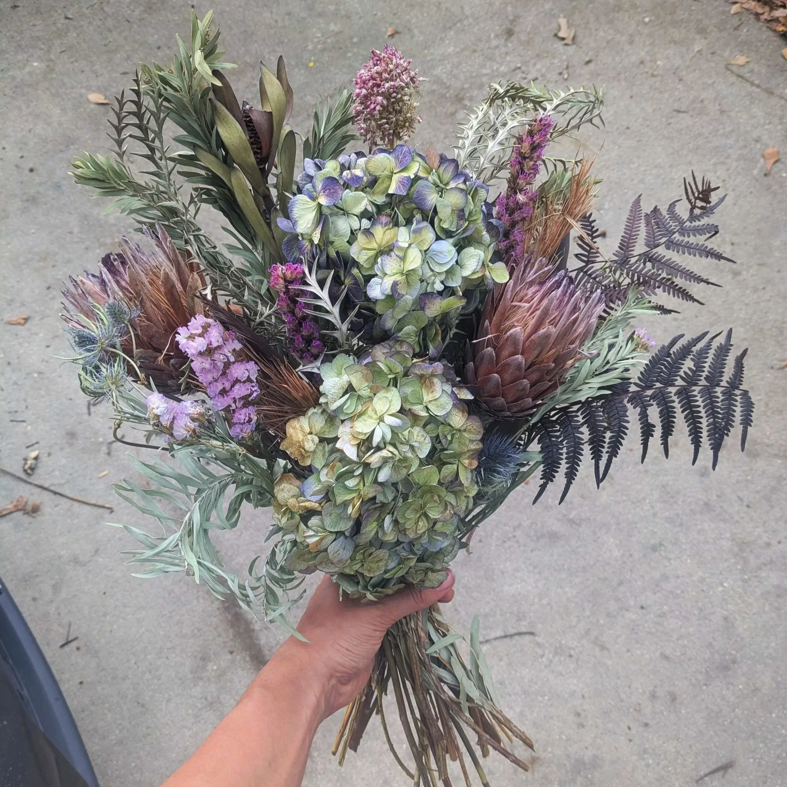 Assorted Traditional and Dried Arrangements