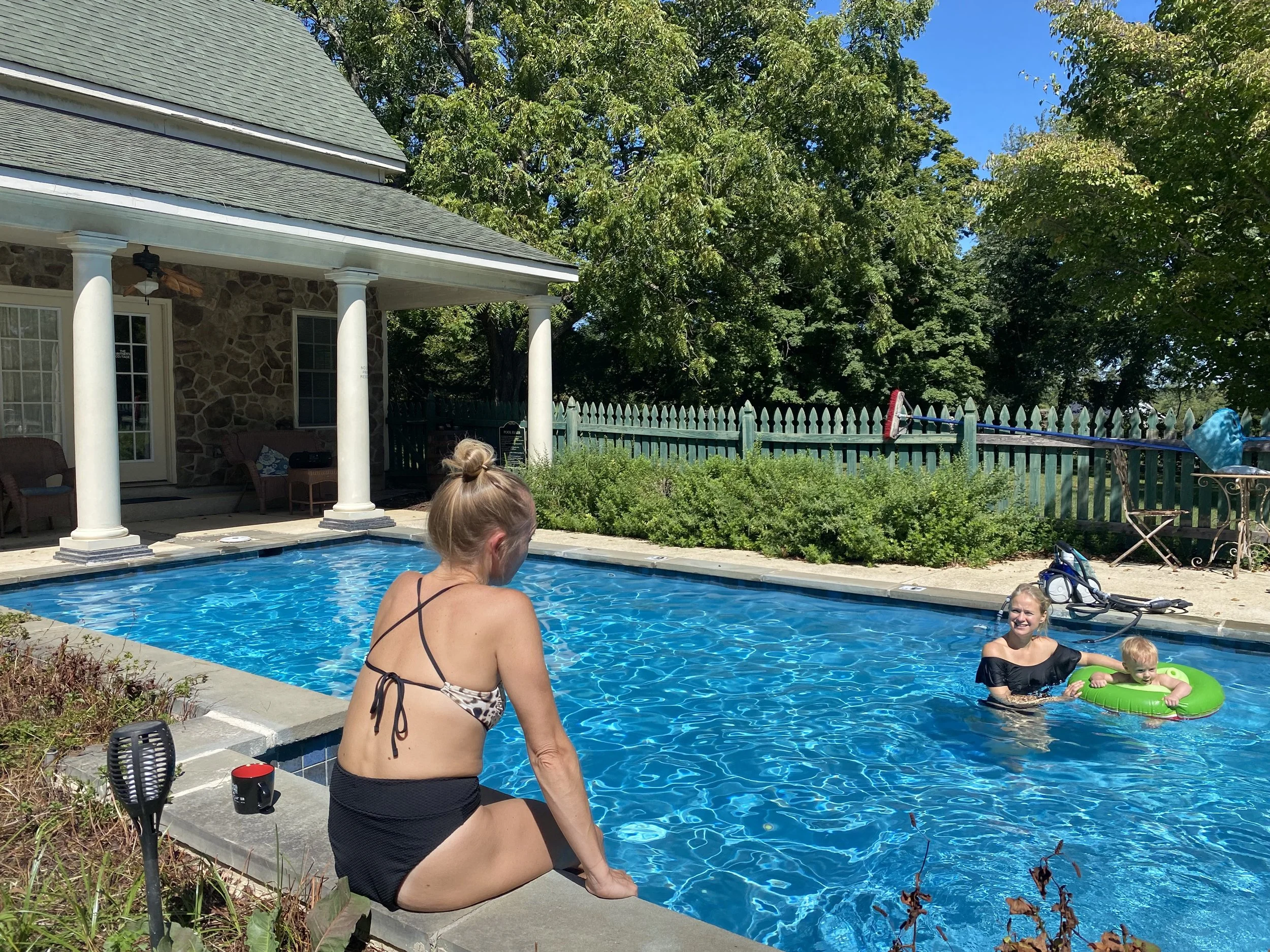 Guests enjoying the seasonal saltwater pool at Barbee's X-ing
