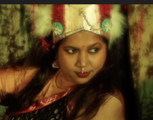 Bharatnatyam Indian dancer with black hair and red lips 