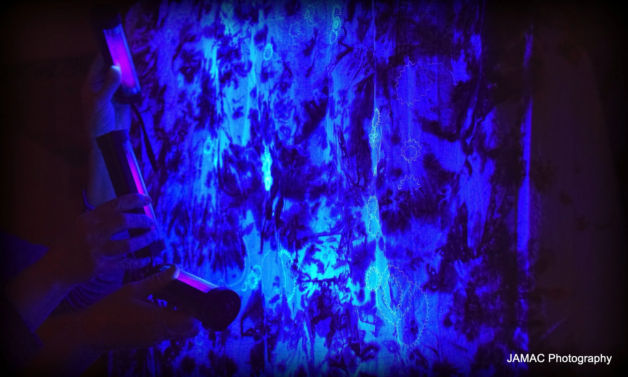 blue black light cloth with white embroidery