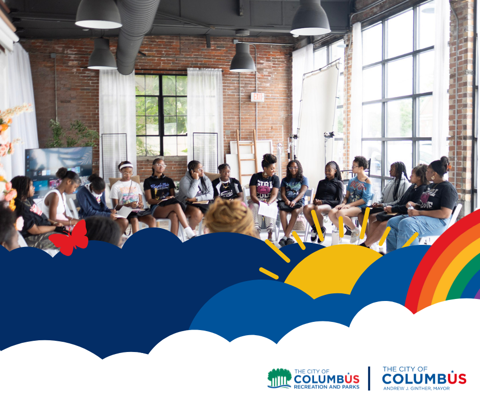 Youth sitting in a circle listening to an instructor