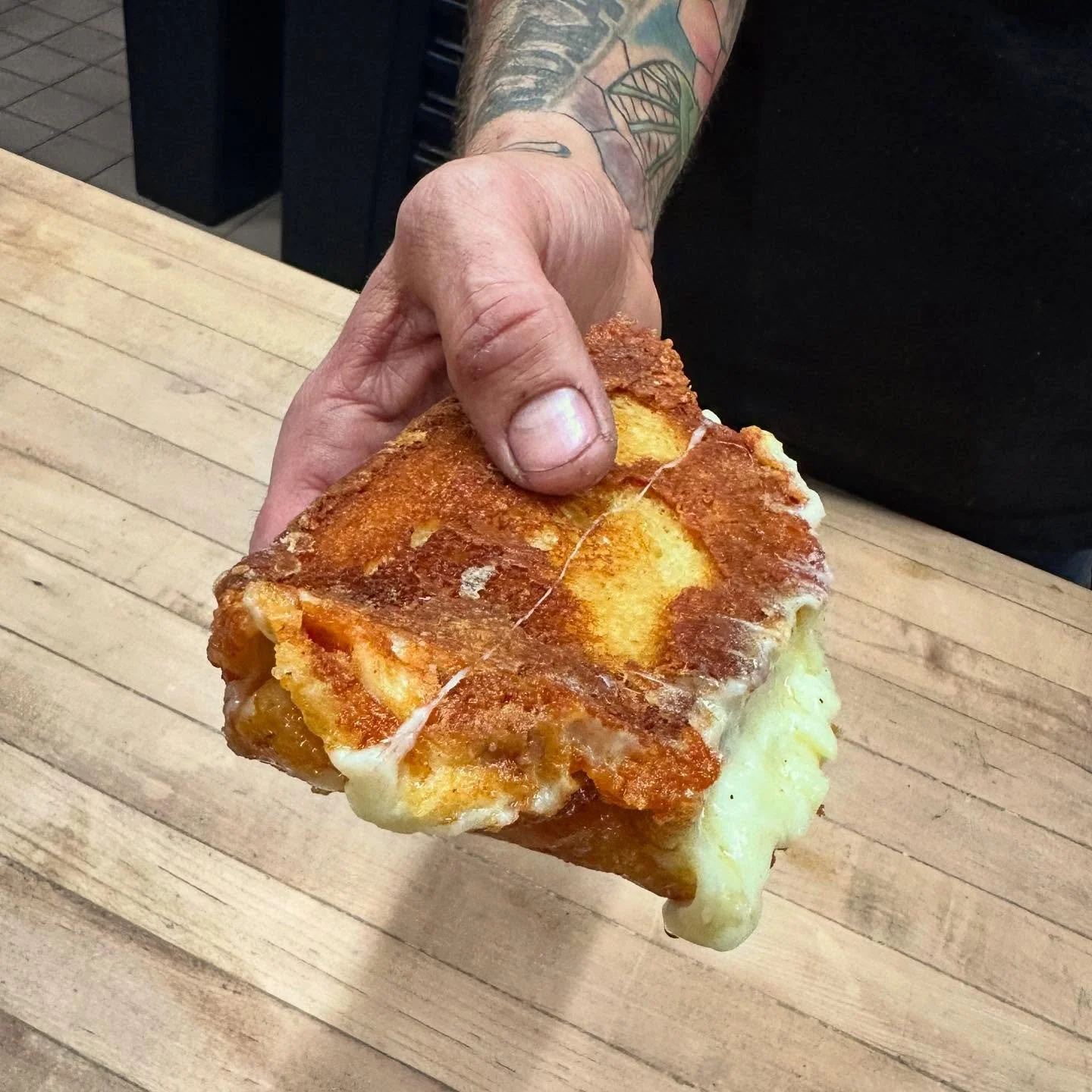 This gnarly looking thing in @dankraus4 &lsquo;s man hands is a kewpi grilled cheese. You can have one to go with some gochujang tomato soup tomorrow from 11-1. Swing by @isla_rasc and grab one!