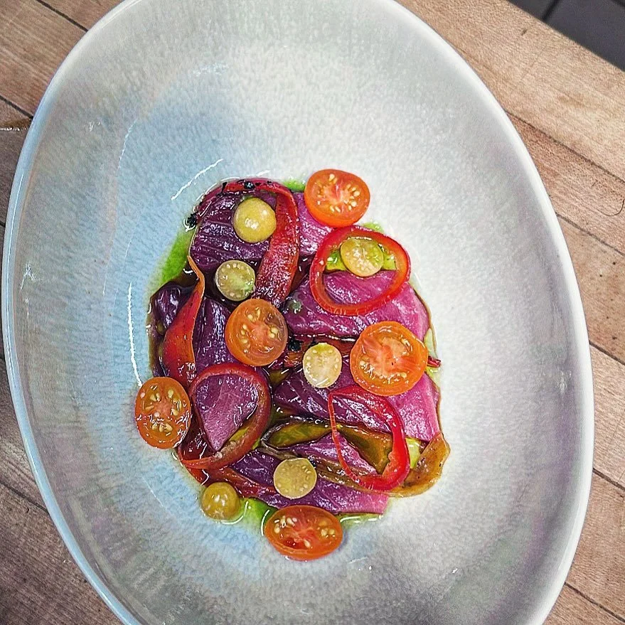 Blue fin on the tortilla press: grilled jimmy nardello peppers, sun golds, aji Rico chilies, ground cherry.  Variations of this dish are now on the menu!