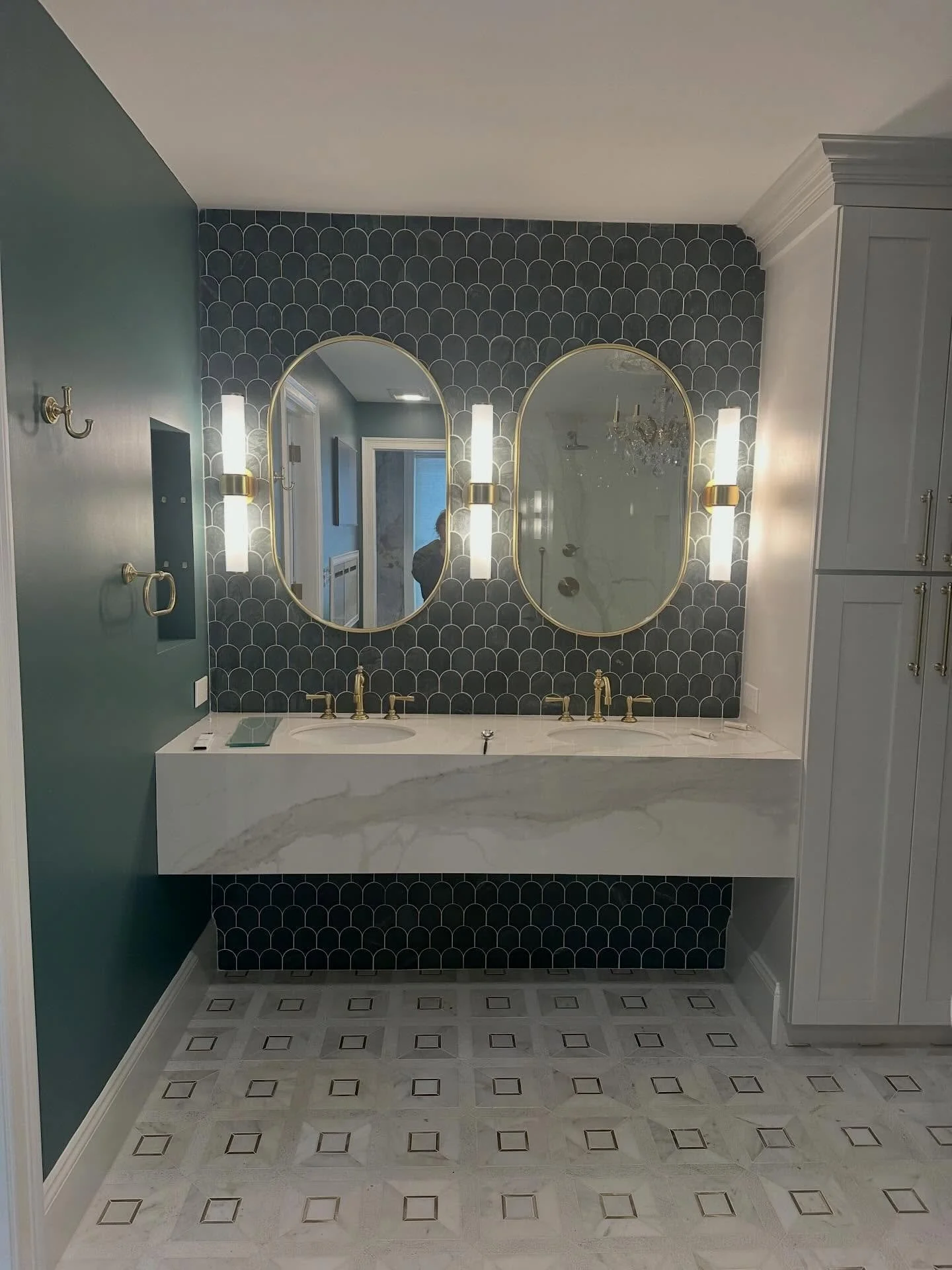 Primary bathroom already had the glam up done so nicely but the walls looked sooo white like it was just primer. The blue @sherwinwilliams #riverway is icing on the cake! The toilet room was already wallpapered in a lime snake skin pattern- all just 