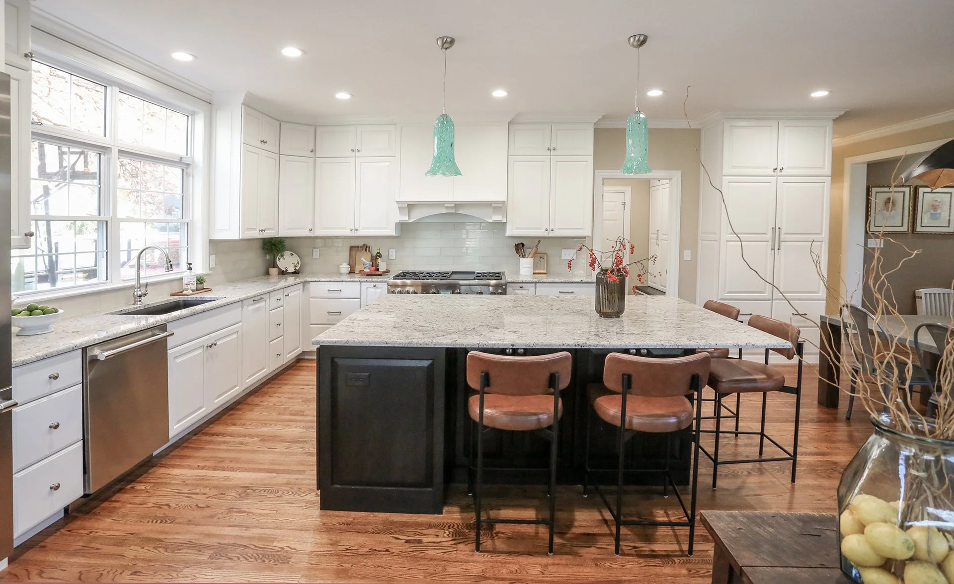Transitional Kitchen With Contrasting Dark Island Cabinetry Kitchen Remodel by 5stone Construction project photo