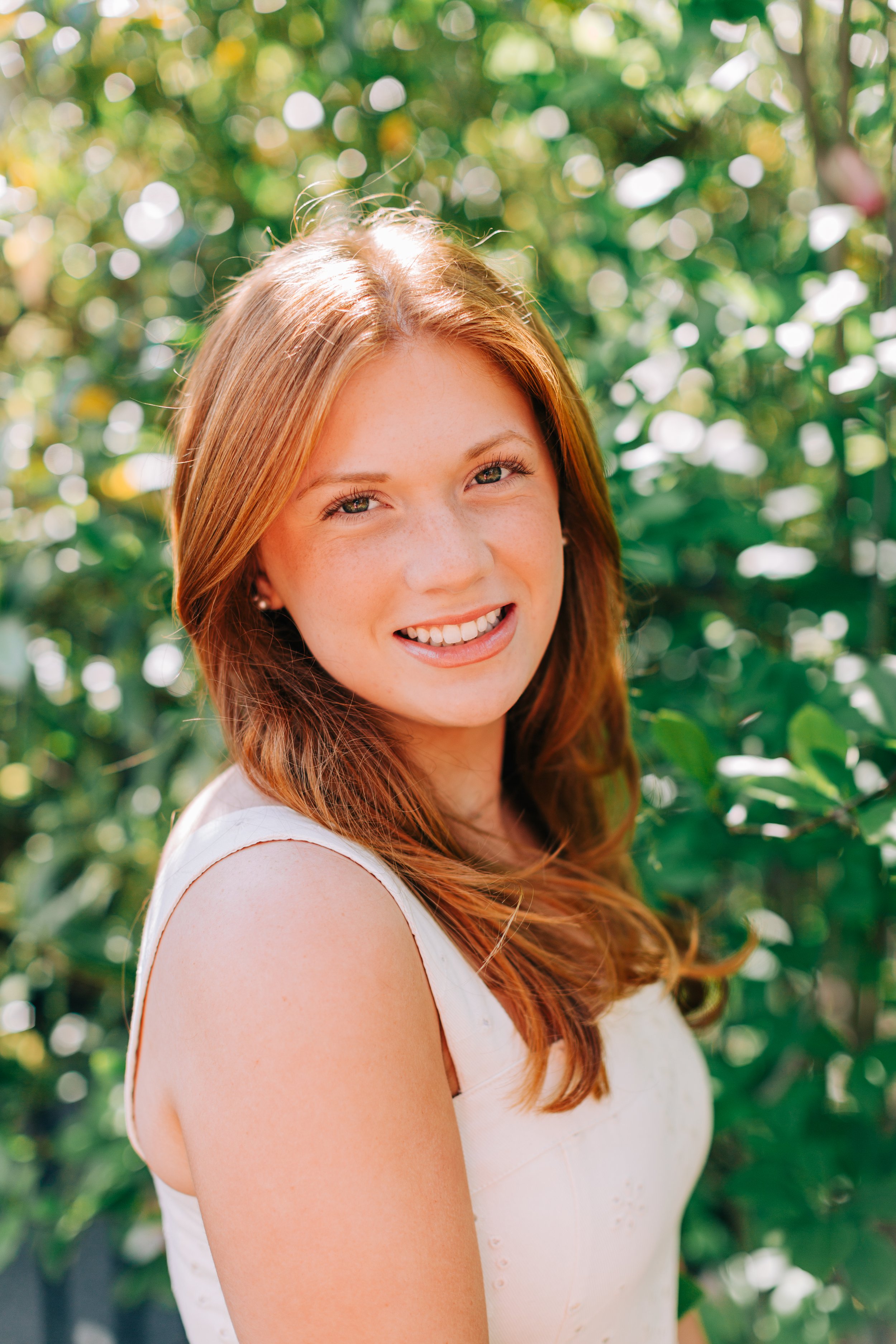 red headed senior portrait close-up at burden gardens in baton rouge