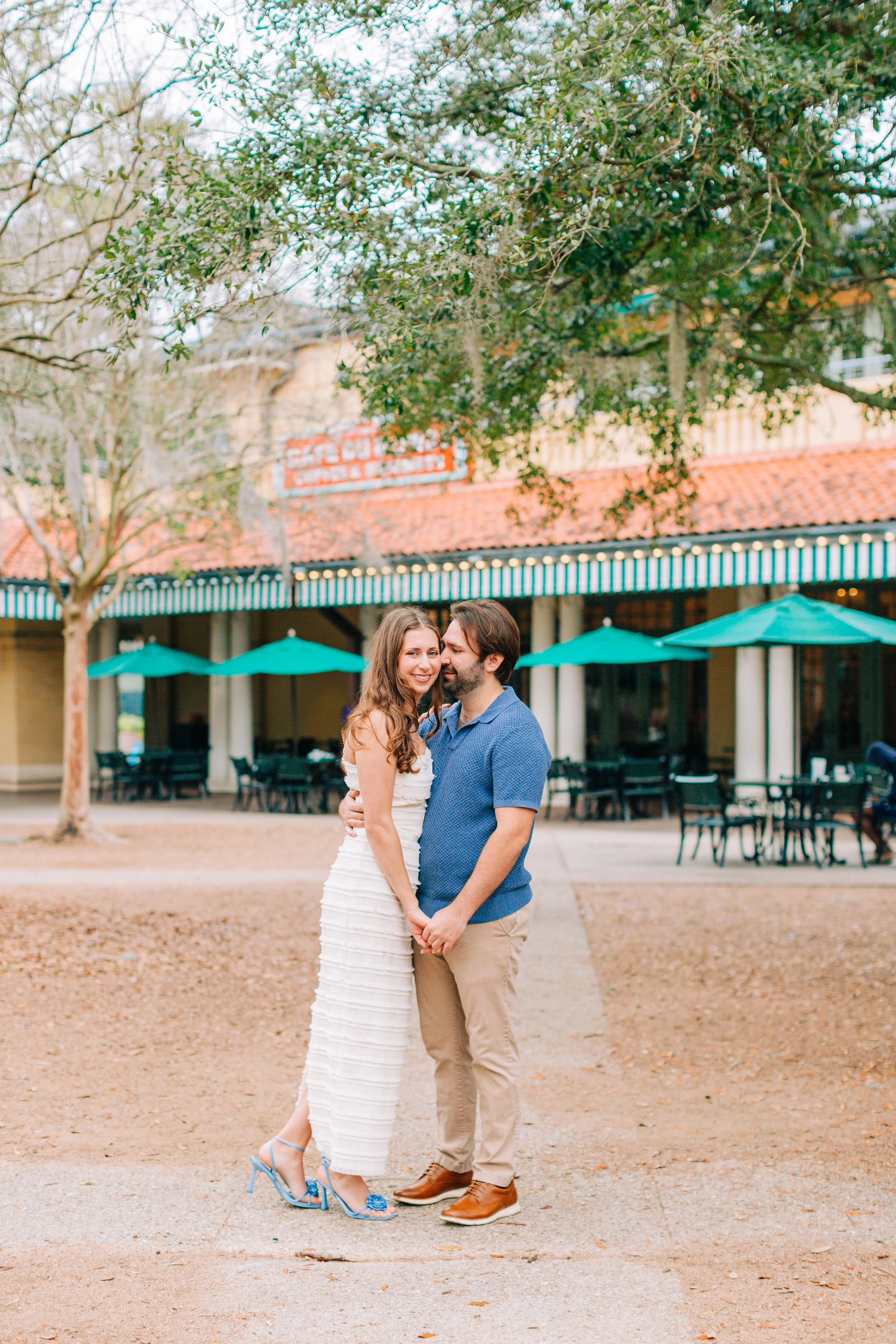 victoria and patrick’s new orleans city park engagement photos, couple dancing in city park in front of café du monde, baton rouge wedding photography, sarah shaw photography