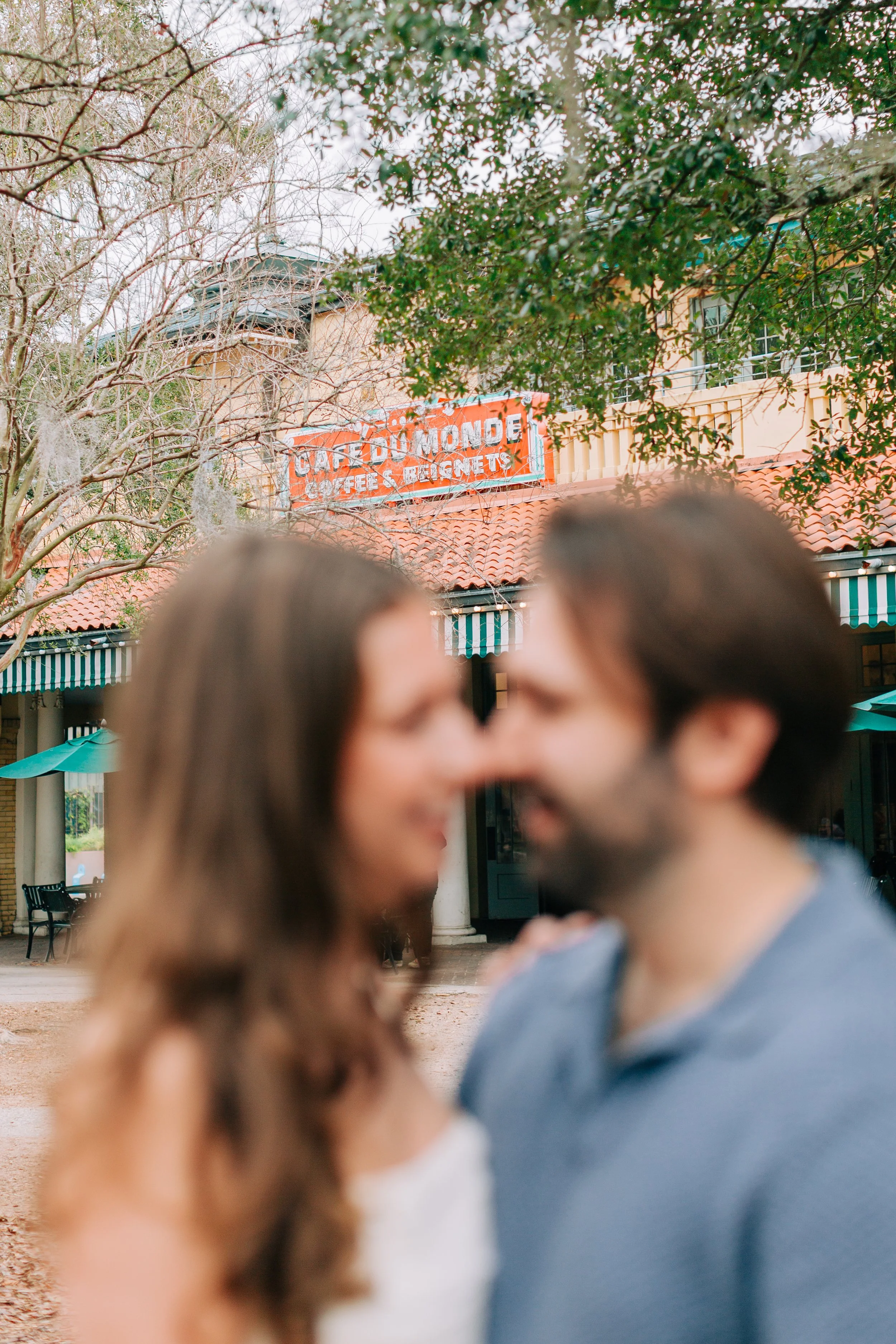 victoria and patrick’s new orleans city park engagement photos, couple dancing in city park in front of café du monde, baton rouge wedding photography, sarah shaw photography