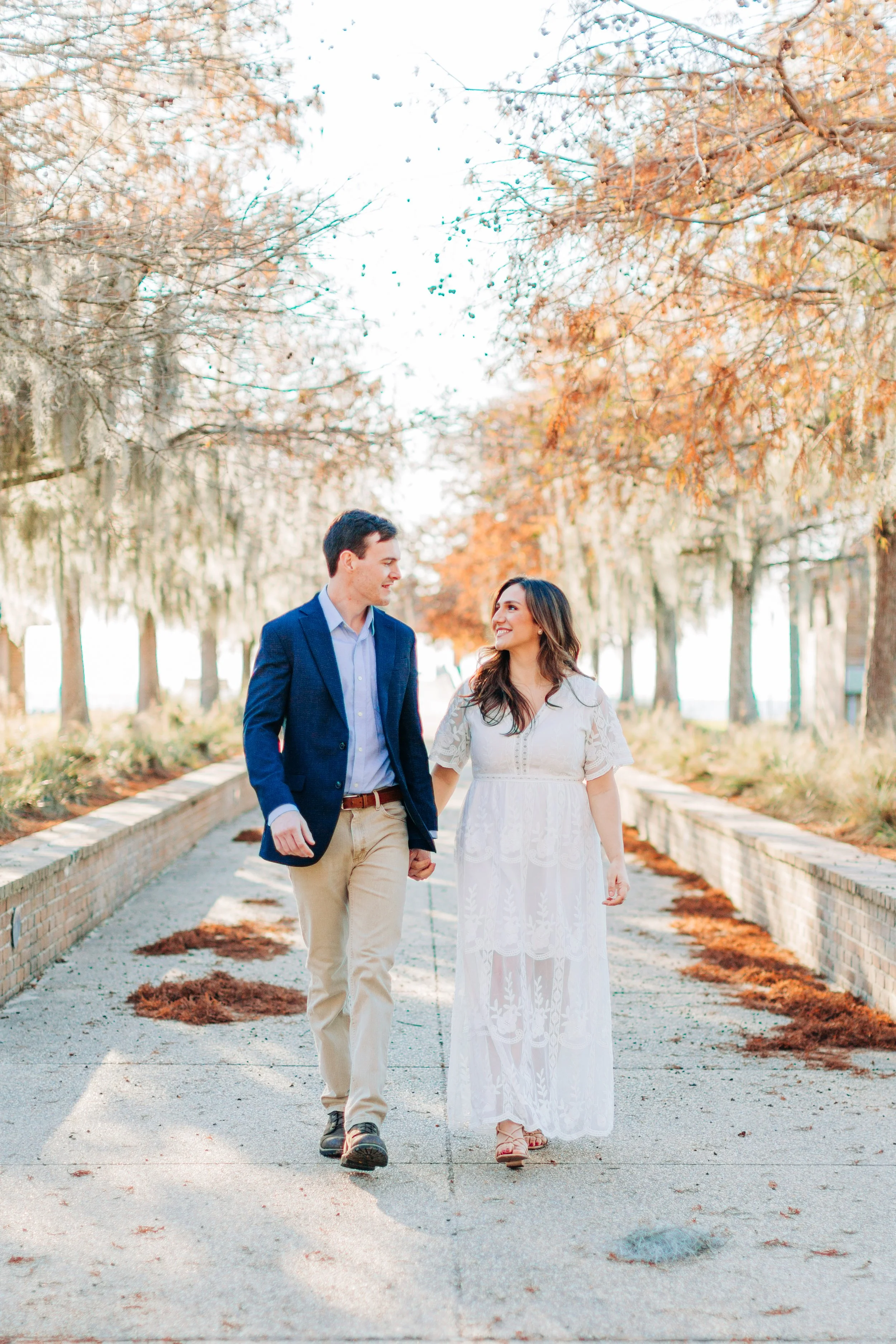 alee and ben’s sunset engagement photos at fontainebleau state park with sarah shaw photography, engagement photos by the water, new orleans engagement photography, baton rouge engagement
