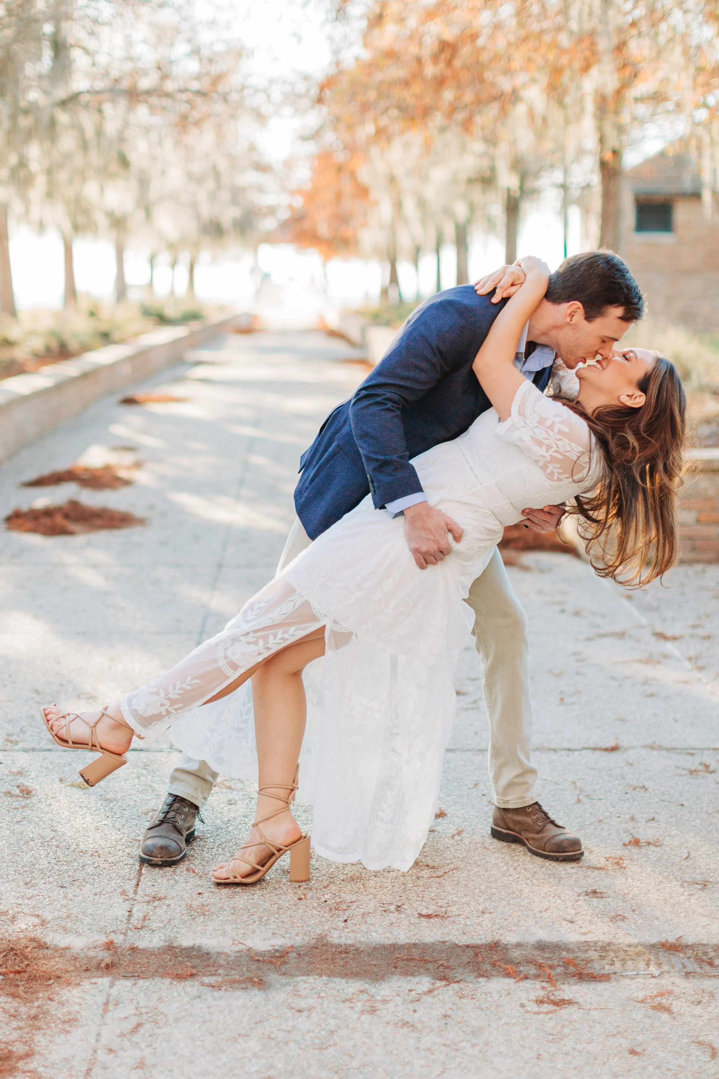 alee and ben’s sunset engagement photos at fontainebleau state park with sarah shaw photography, engagement photos by the water, new orleans engagement photography, baton rouge engagement