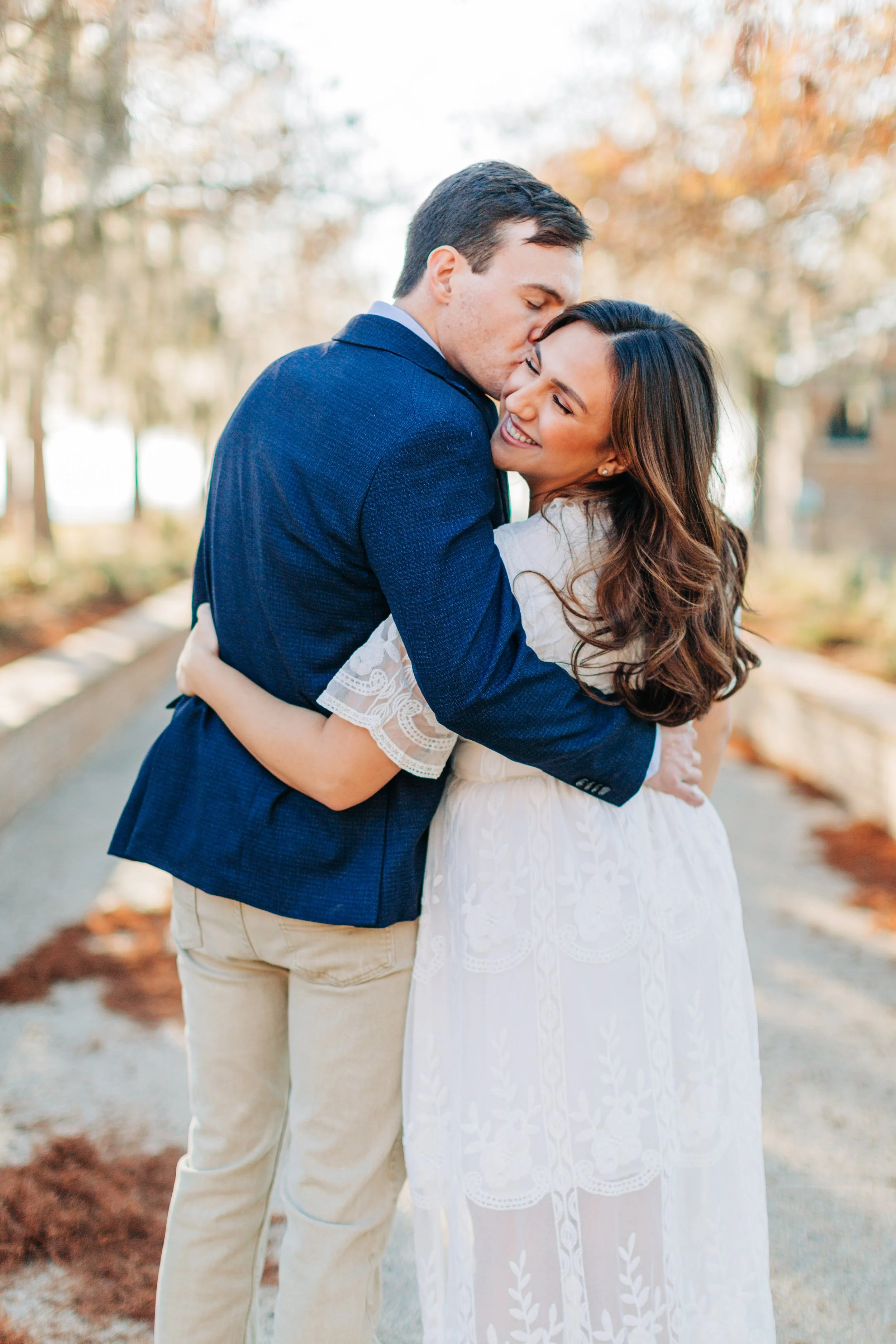 alee and ben’s sunset engagement photos at fontainebleau state park with sarah shaw photography, engagement photos on a dock by the water, new orleans engagement photography, baton rouge engagement