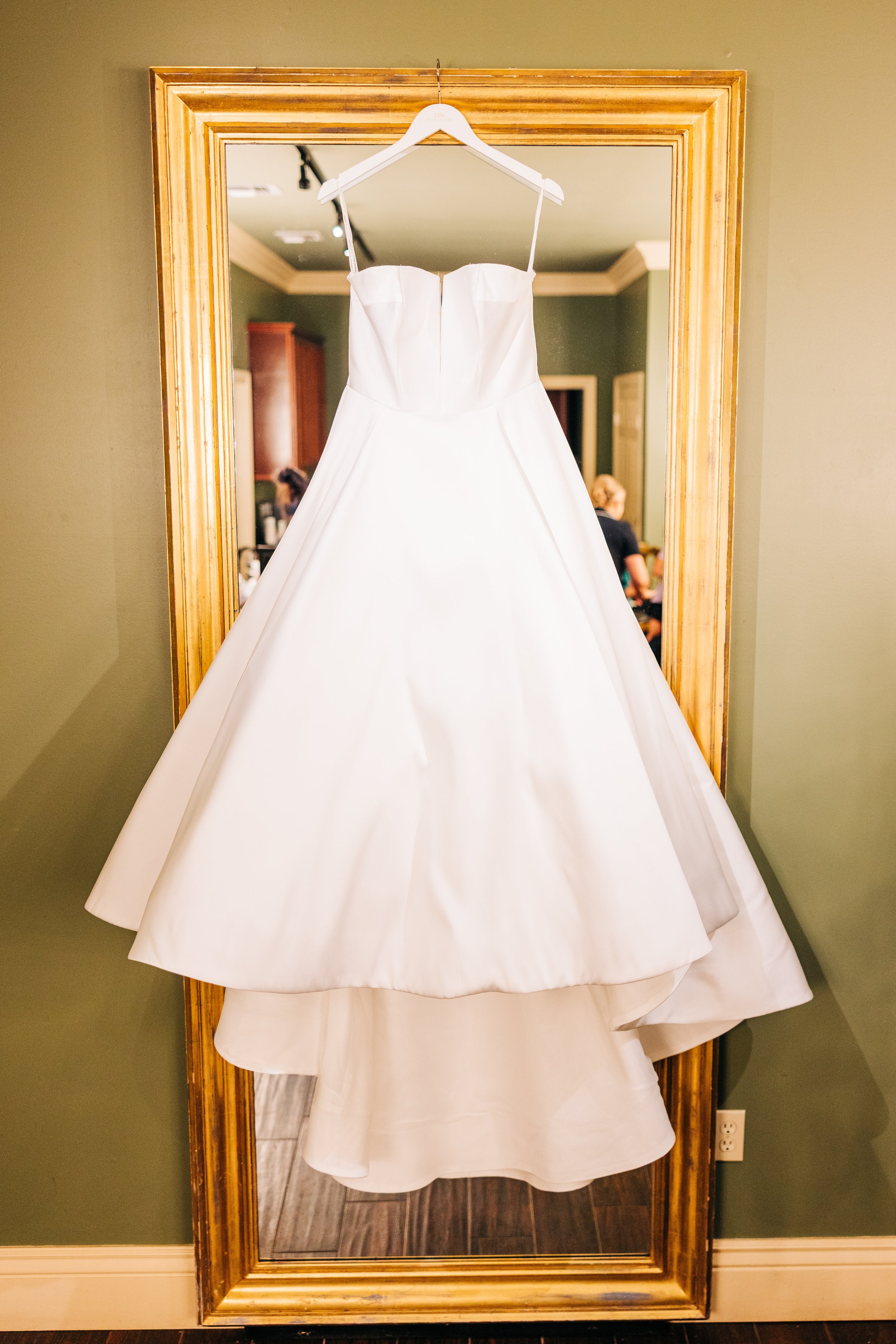 wedding dress hanging in the bridal suite at the neptune, houmas house weddings, baton rouge wedding photography, sarah shaw