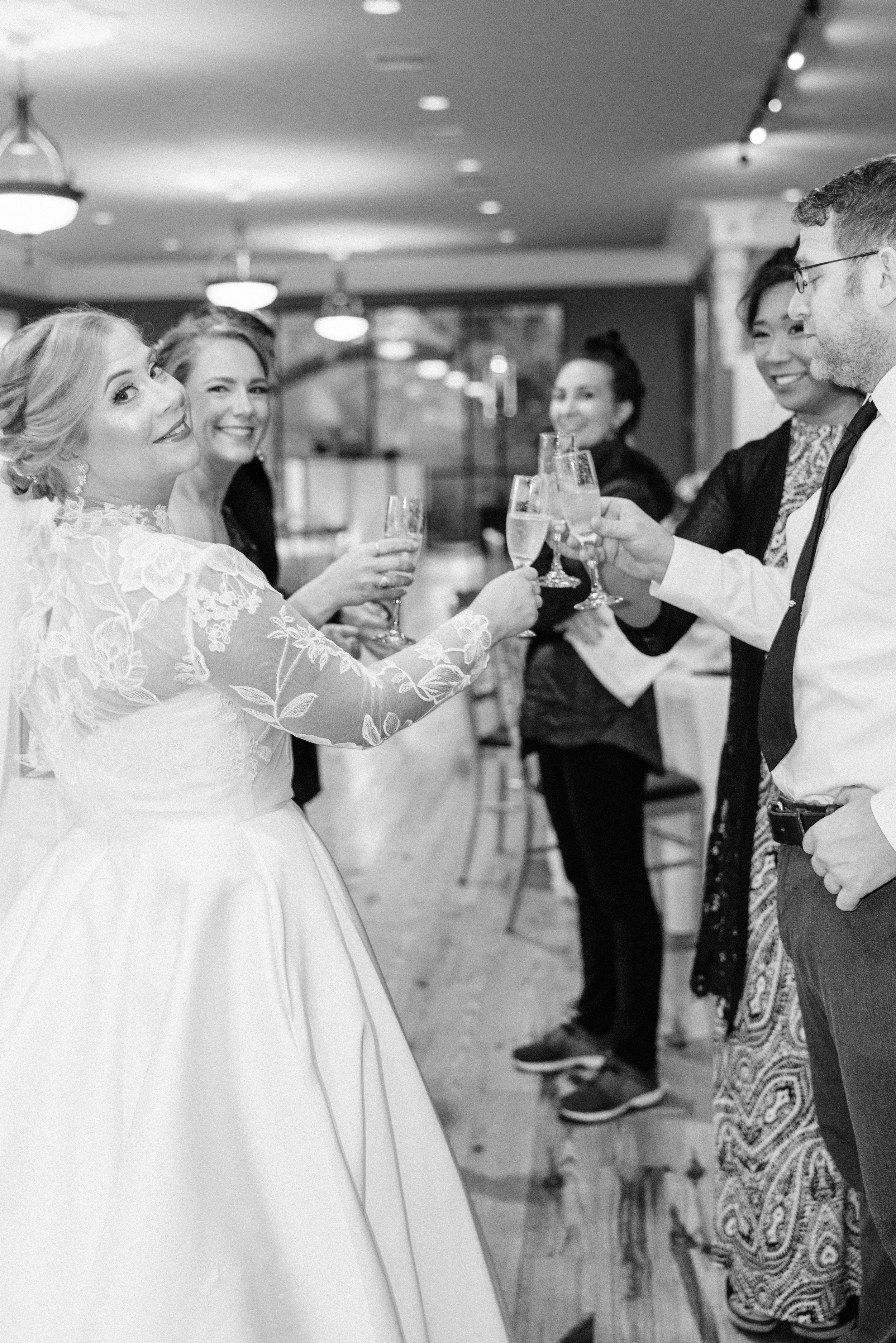 bride and friends cheers with champagne at the neptune house, houmas house wedding photography, baton rouge wedding photography