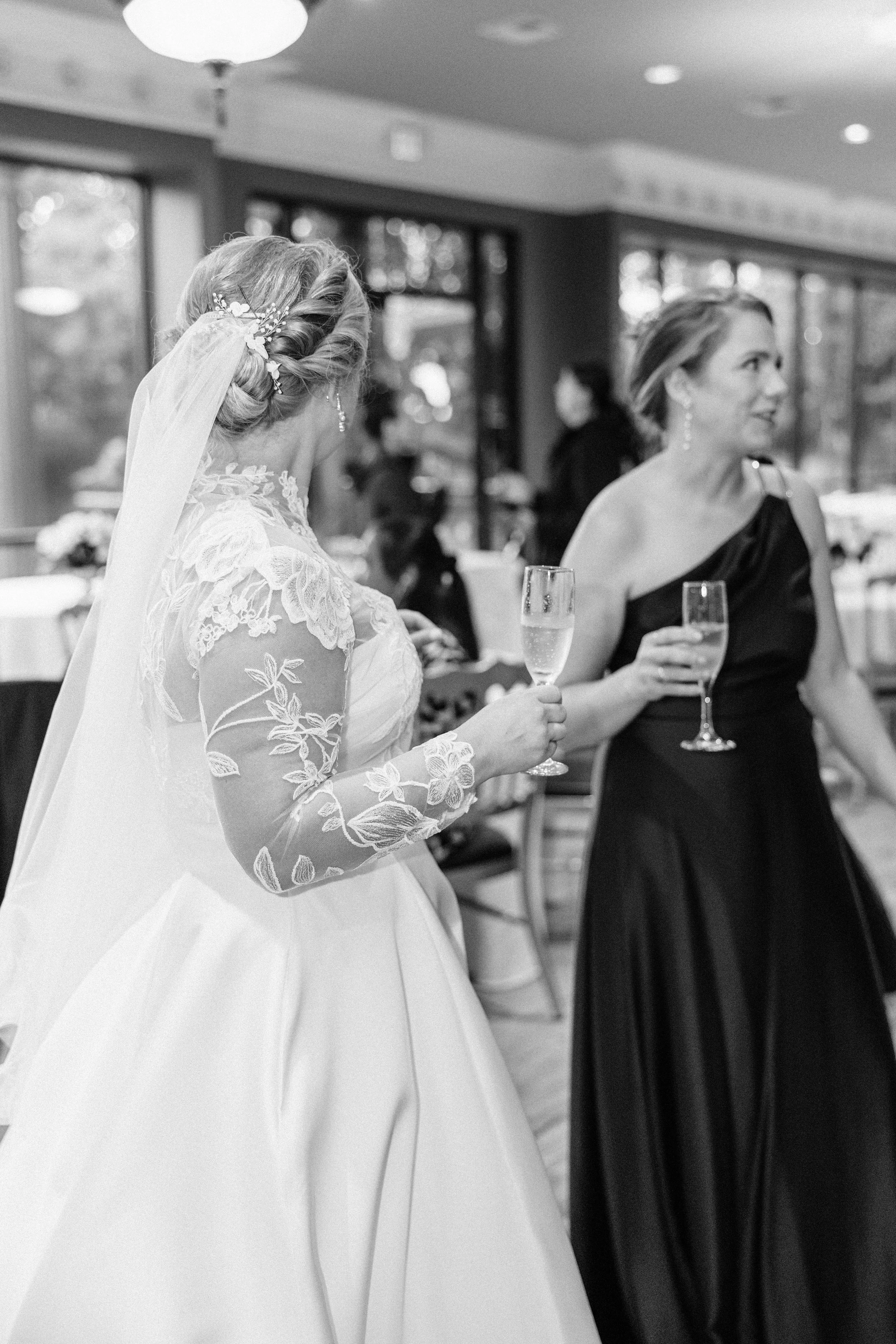 bride and friends cheers with champagne at the neptune house, houmas house wedding photography, baton rouge wedding photography