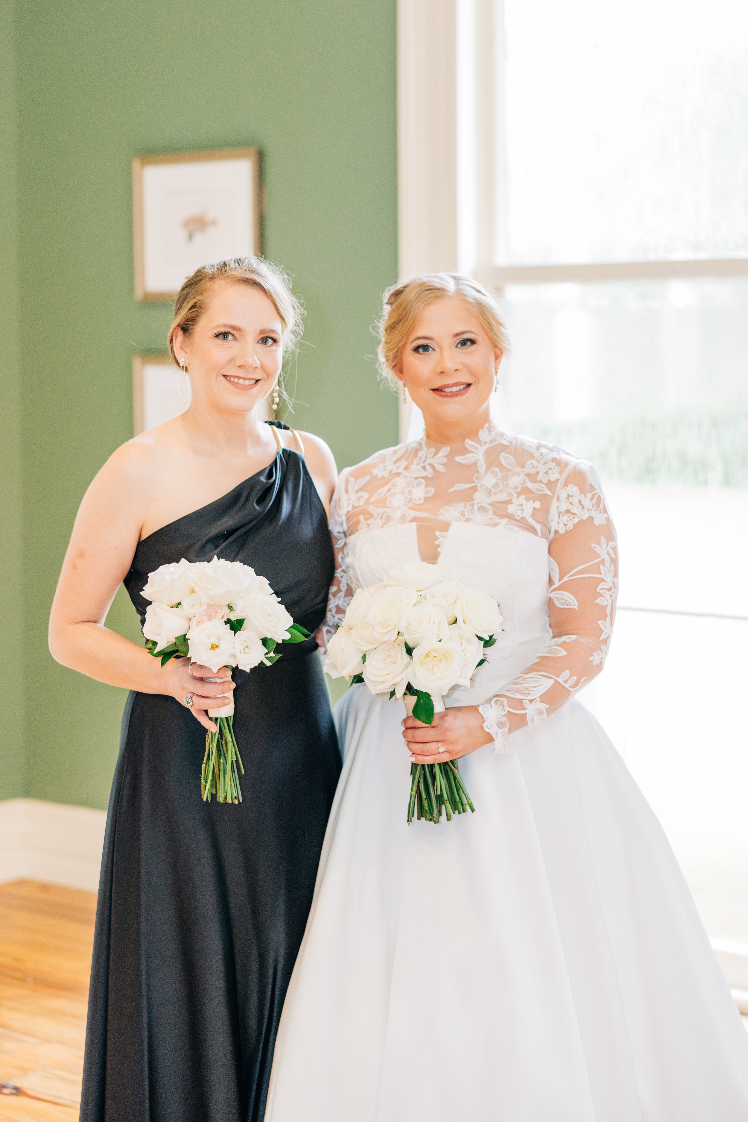 bride and maid of honor smiling in the neptune at houmas house, bridal portraits at houmas house baton rouge, baton rouge wedding photography, sarah shaw photography