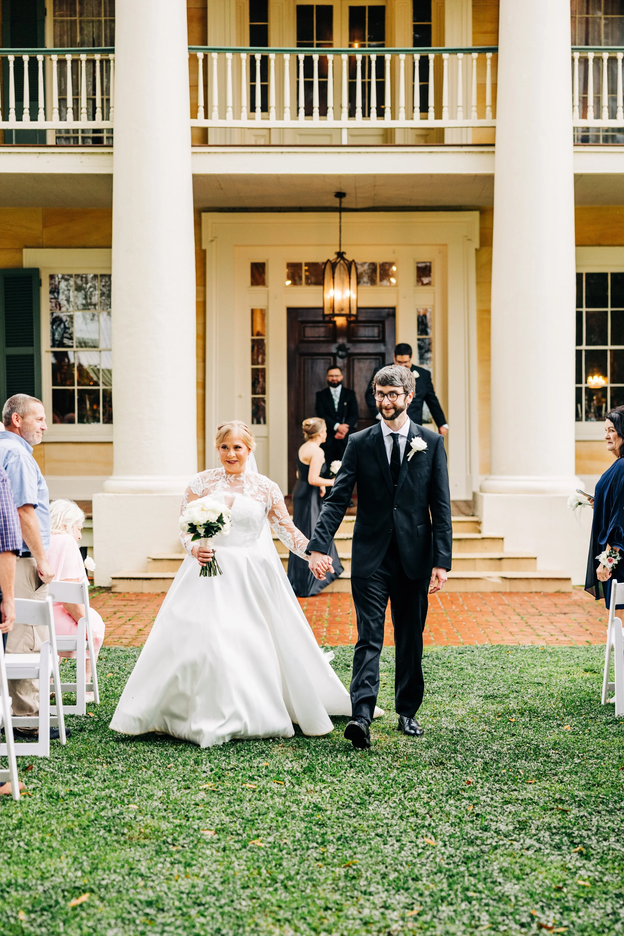 bride and groom formal recession from ceremony, formal ceremony exit, outdoor wedding ceremony in spring at houmas house, baton rouge wedding photography