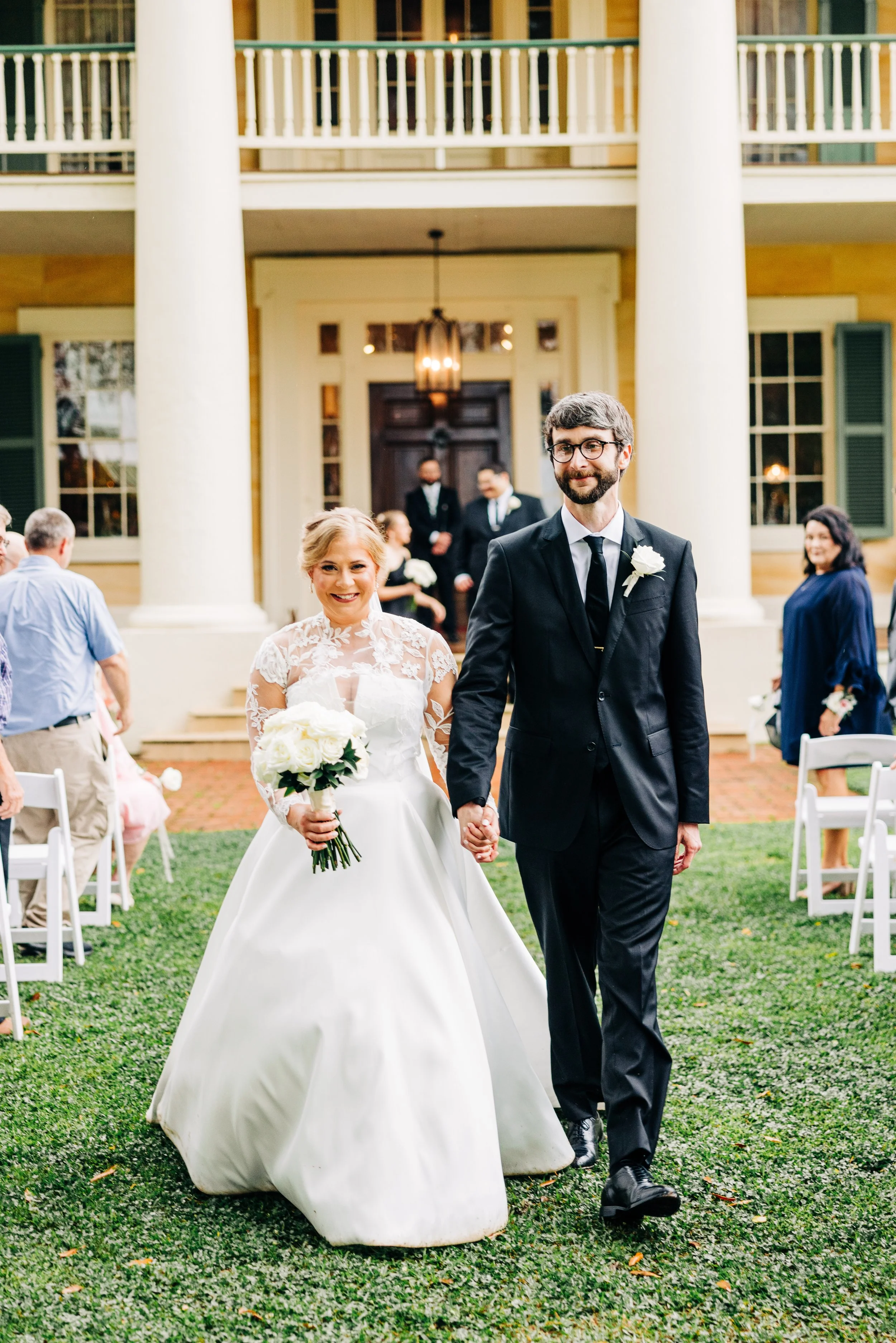 bride and groom formal recession from ceremony, formal ceremony exit, outdoor wedding ceremony in spring at houmas house, baton rouge wedding photography