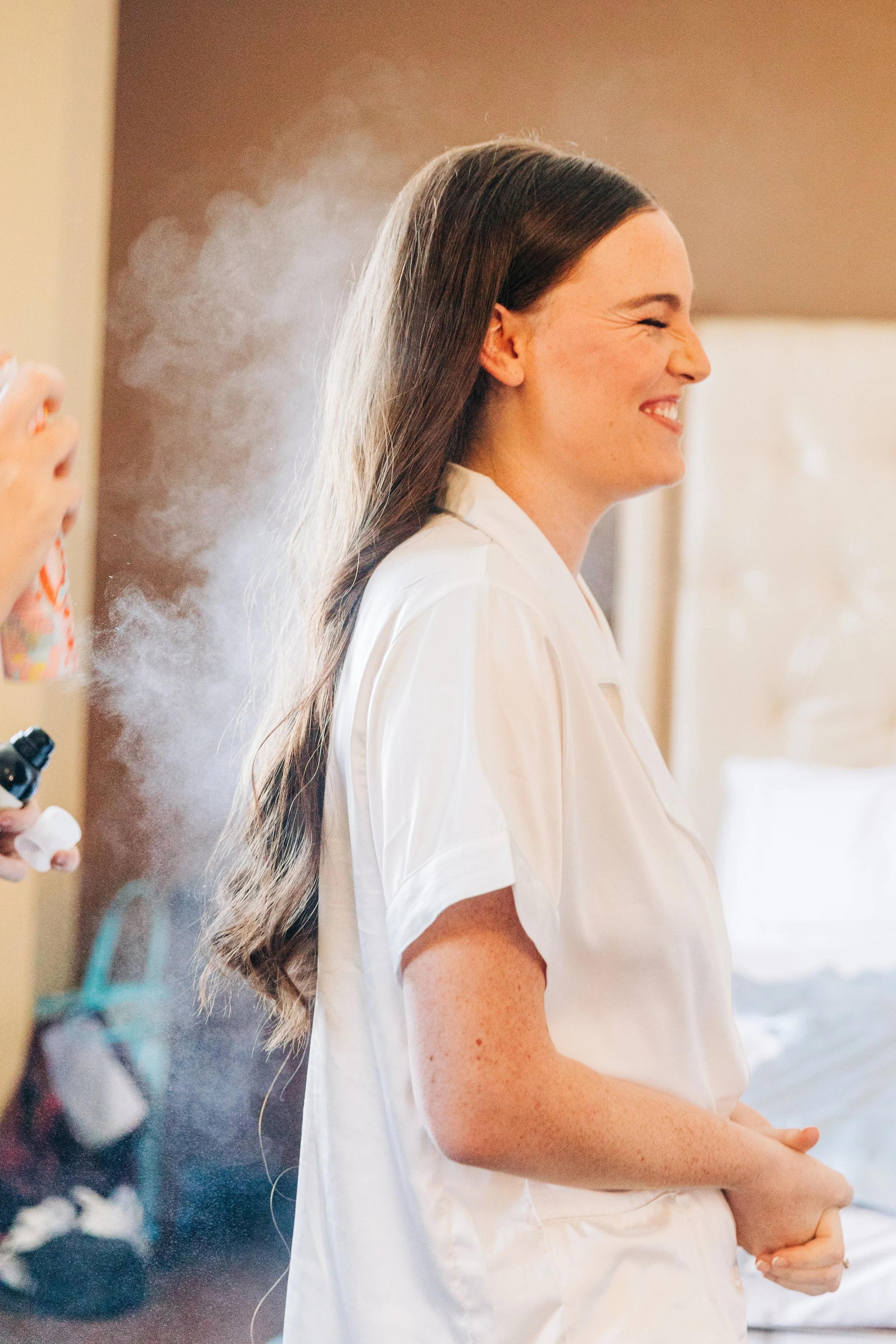 Bride getting ready photo showing hairspray and bridal hair at Baton Rouge wedding