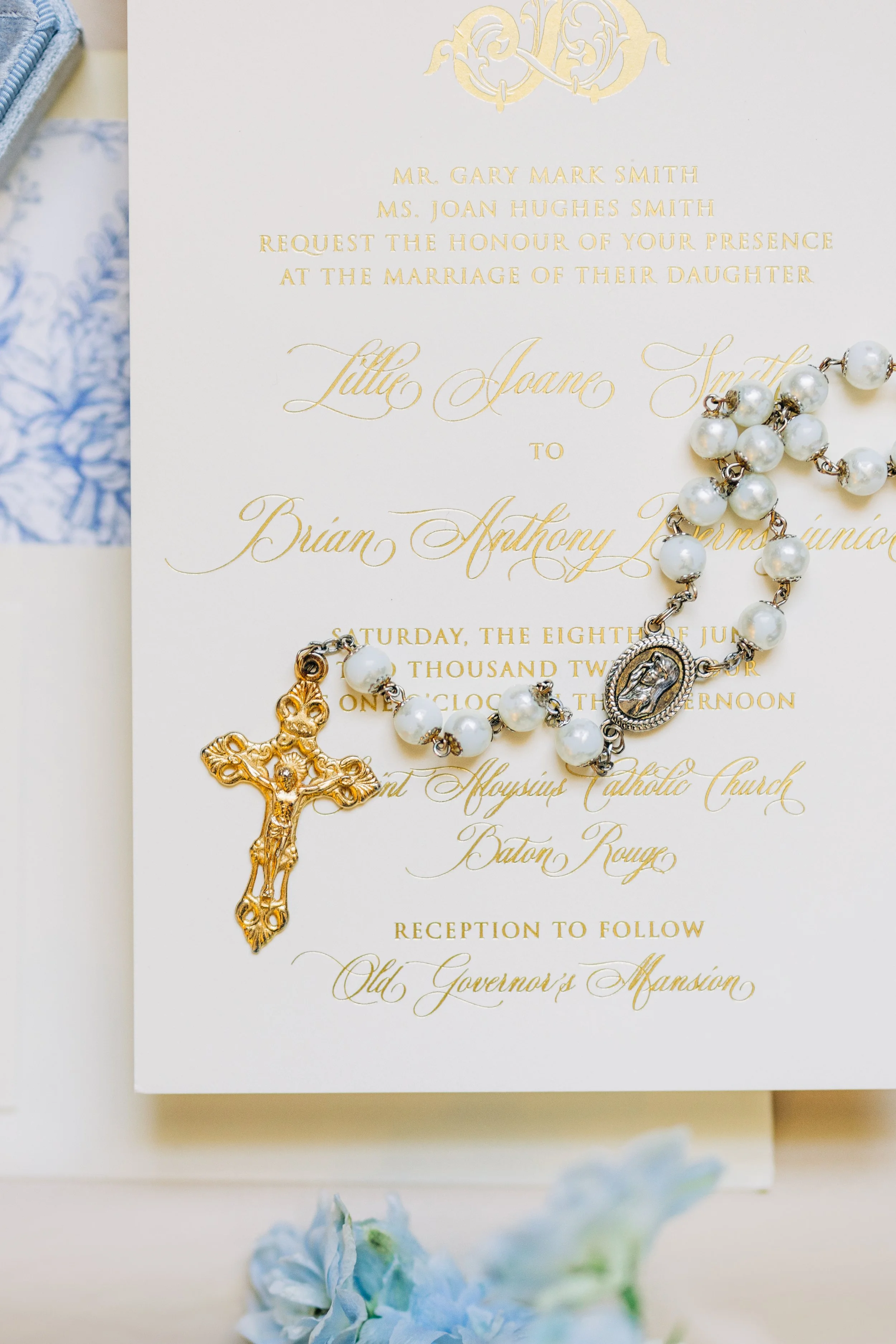Bridal details and invitation suite with rosary at Baton Rouge wedding