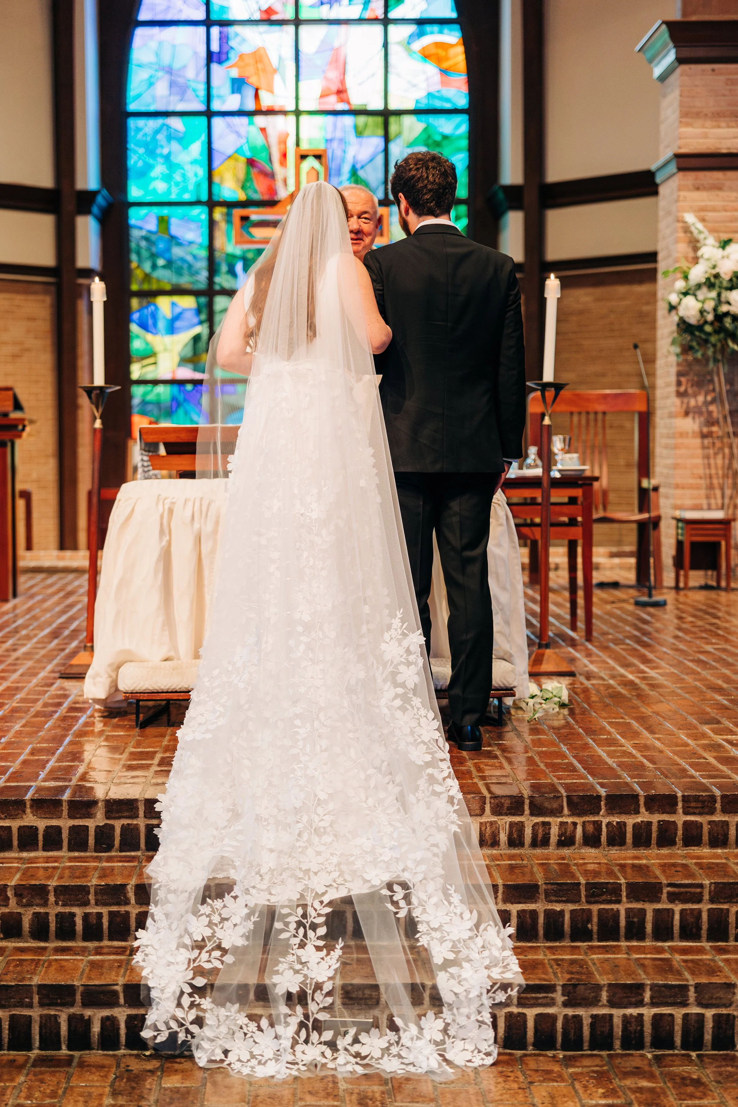 bride and groom at altar during baton rouge wedding ceremony