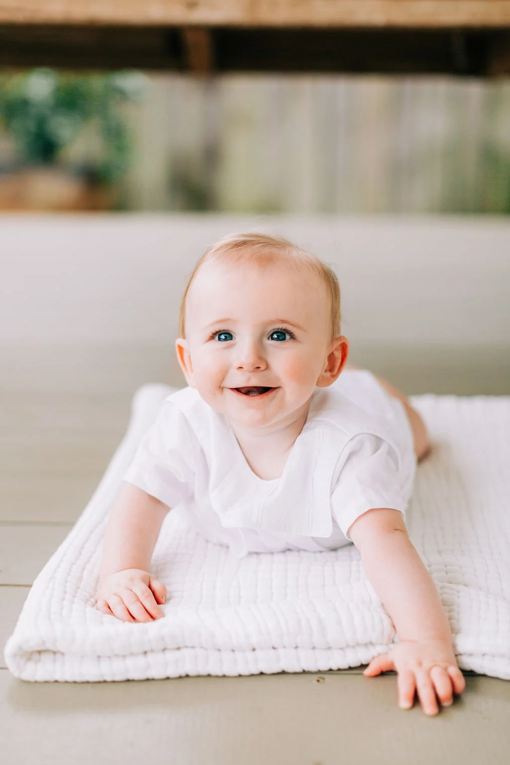 Happy baby boy milestone portraits at 6 months in Baton Rouge