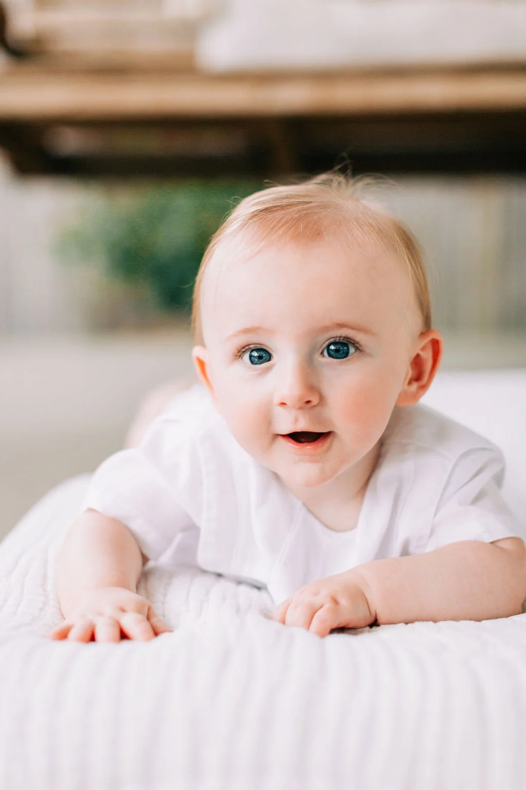 6 month baby boy smiling during milestone session in Baton Rouge