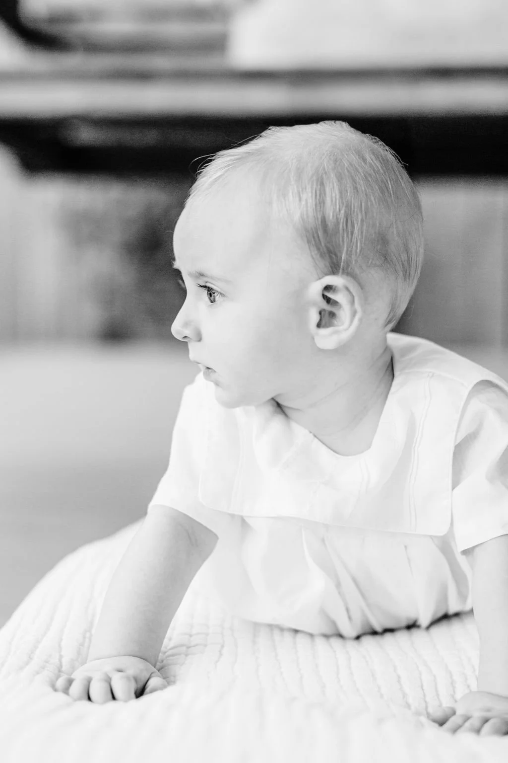 6 month baby boy side portrait during milestone session in Baton Rouge