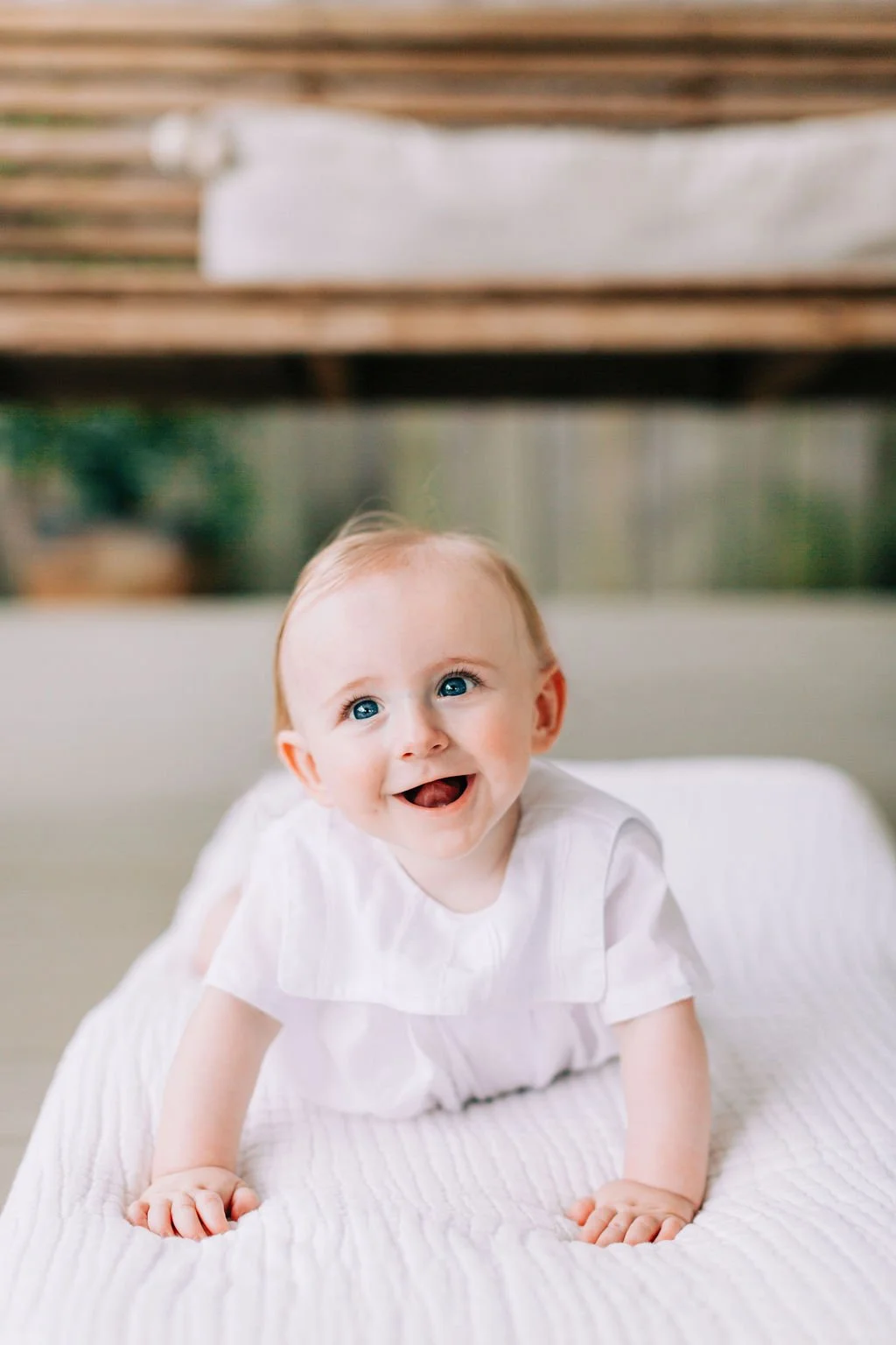 6 month baby boy side portrait during milestone session in Baton Rouge