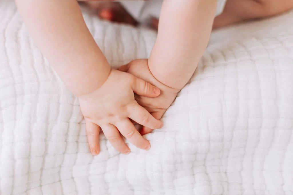 Close up of baby hands during Baton Rouge milestone photos