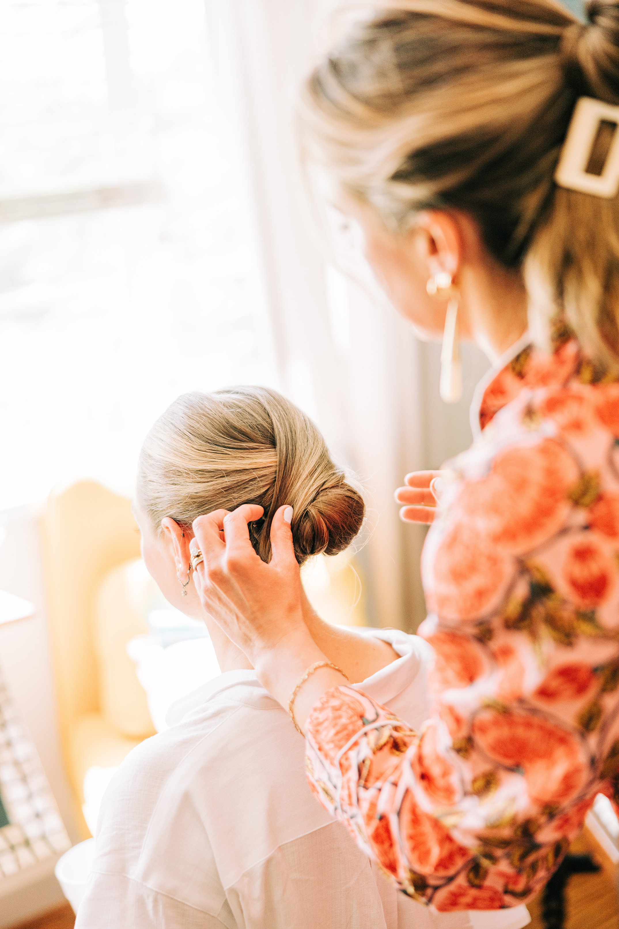 bride getting her hair done during getting ready at baton rouge wedding