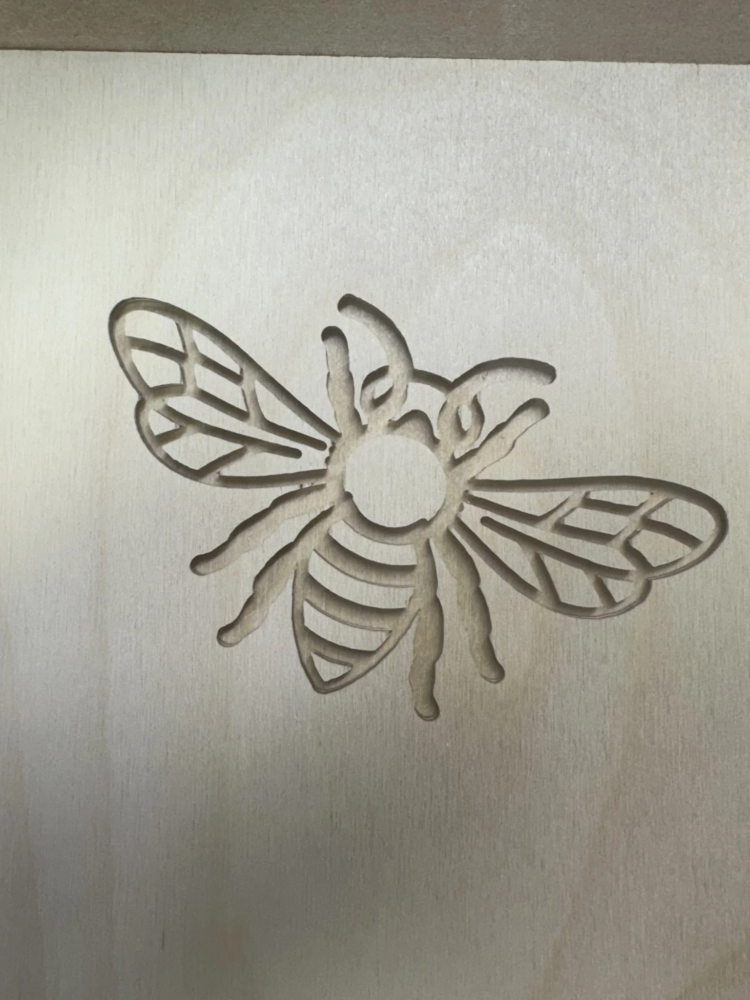 Honeybee inlay pocket in Baltic birch plywood