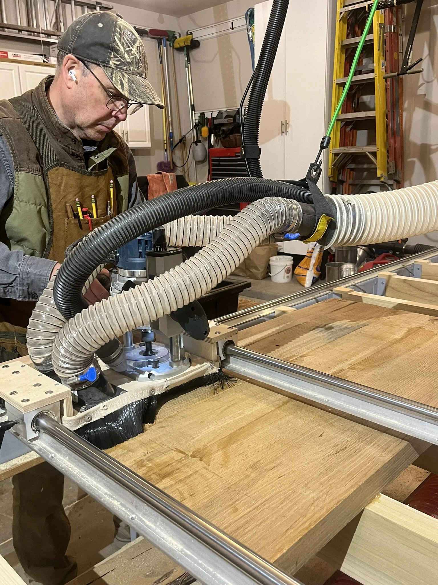 Bryan at Motor City Woodshop flattening a white oak slab.