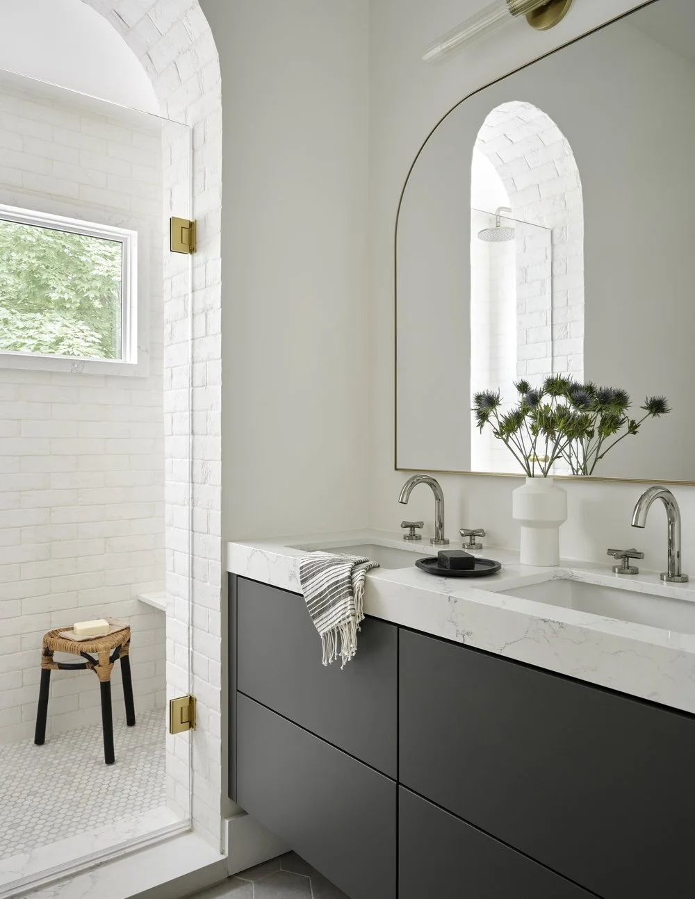 Finished primary ensuite with arched shower entrance and double vanity, Grace Street Victorian renovation Toronto