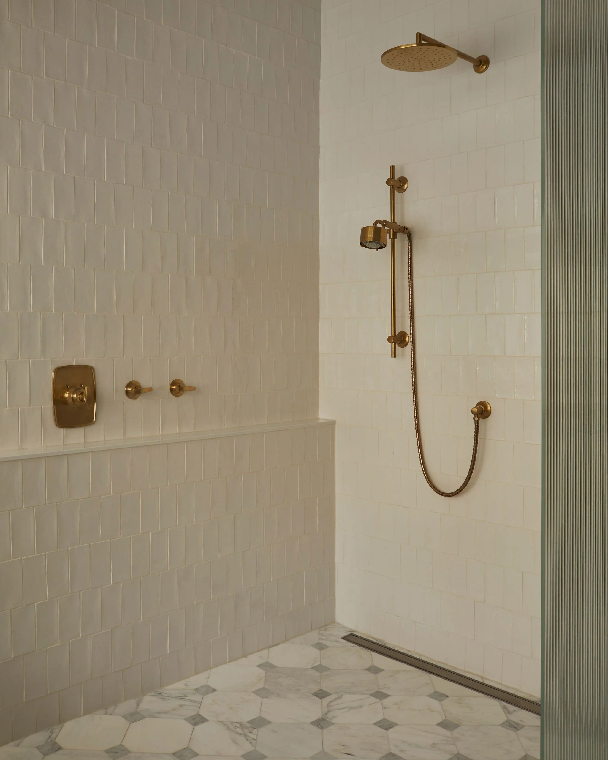 unionville-primary-bathroom-walk-in-shower-brass-fixtures-megan-crosbie-design.jpg