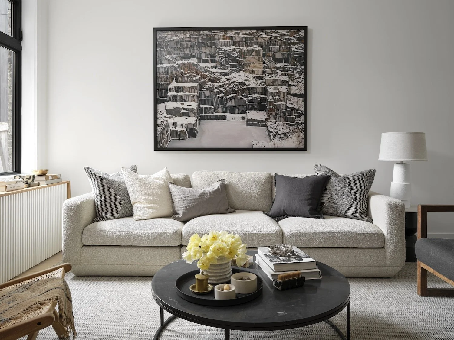 Finished living room with boucle sofa and radiator cover, Grace Street Victorian renovation Toronto