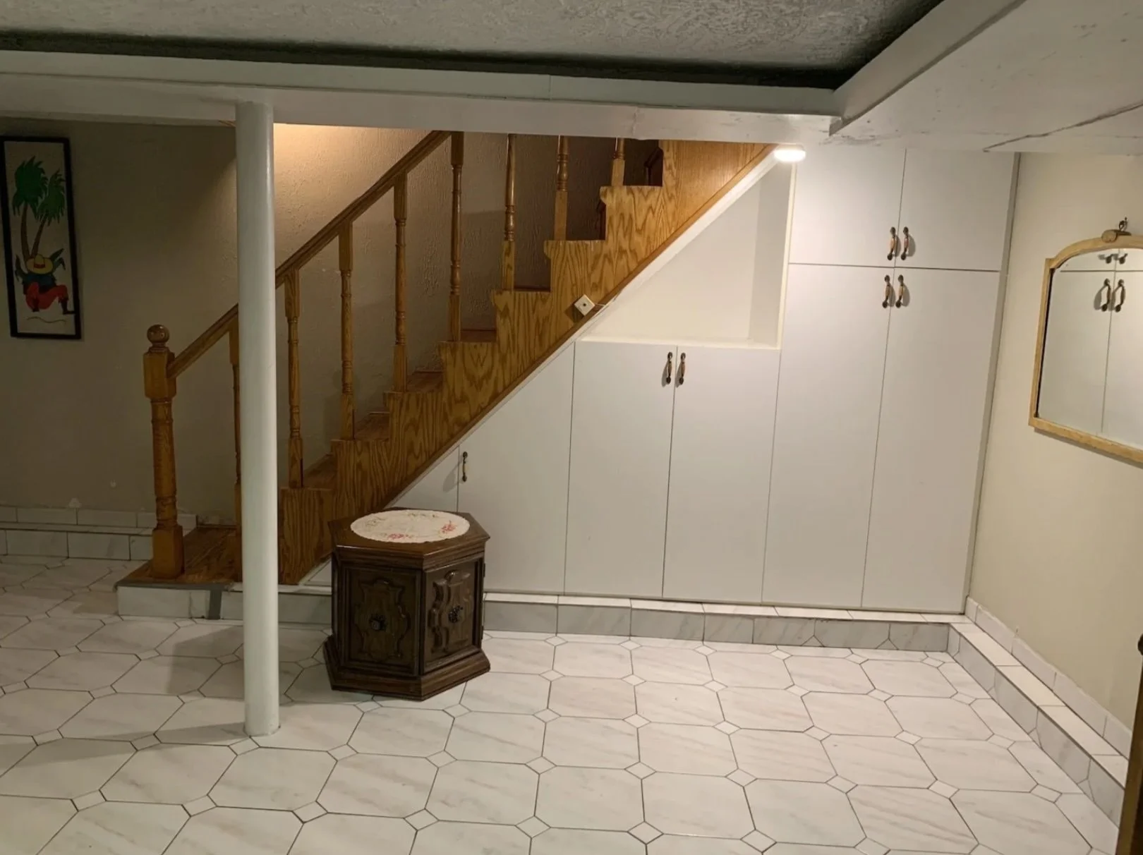 Original basement stairs and tile before renovation, Grace Street Victorian home Toronto