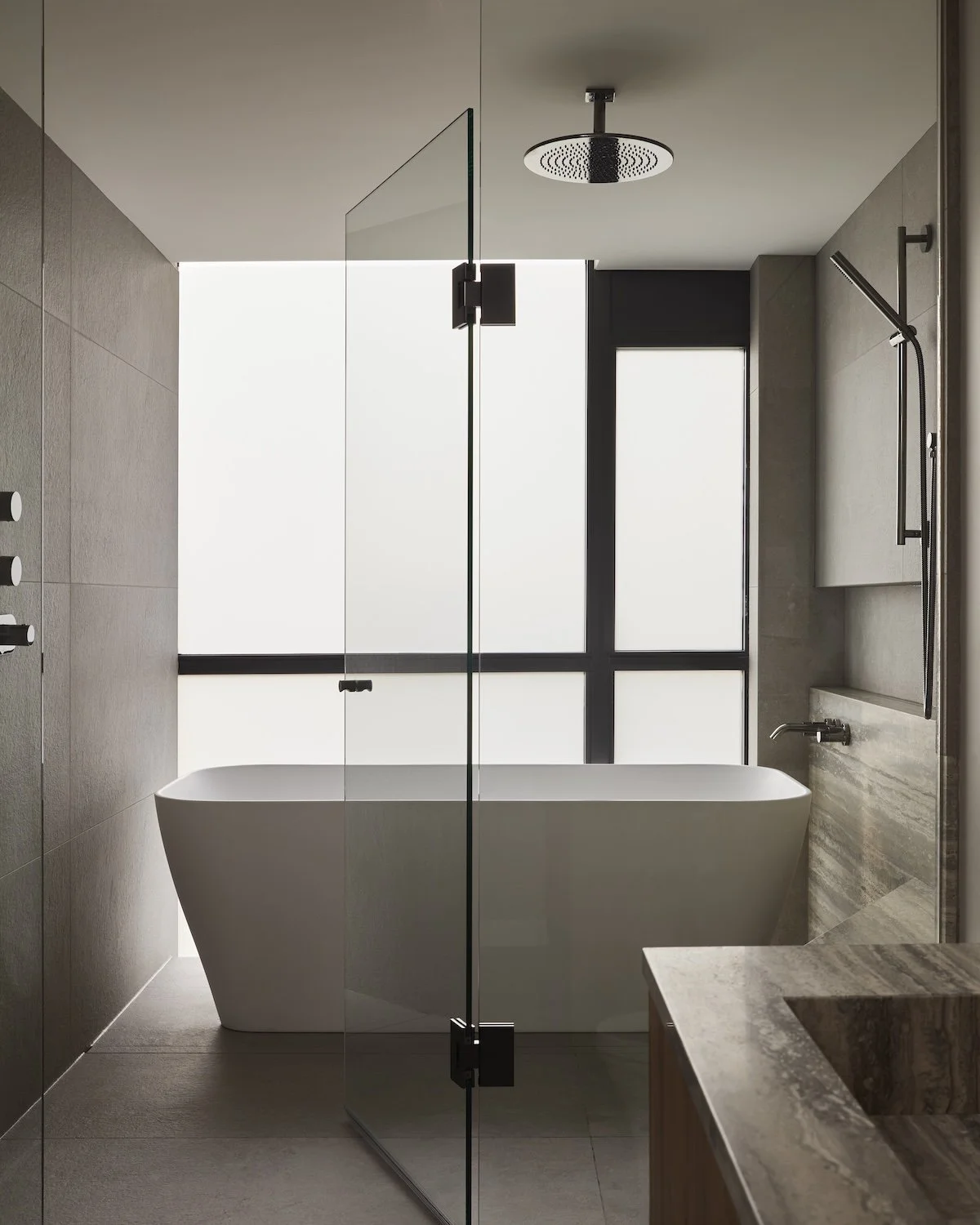 niagara-condo-ensuite-bathroom-freestanding-tub-megan-crosbie-design.jpg