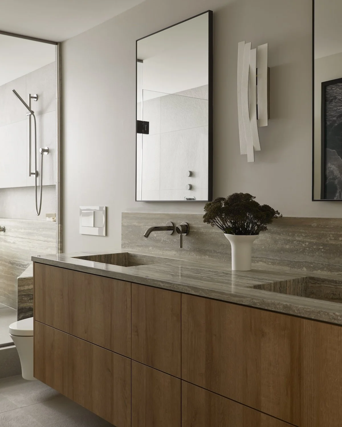 niagara-condo-ensuite-bathroom-stone-vanity-megan-crosbie-design.jpg