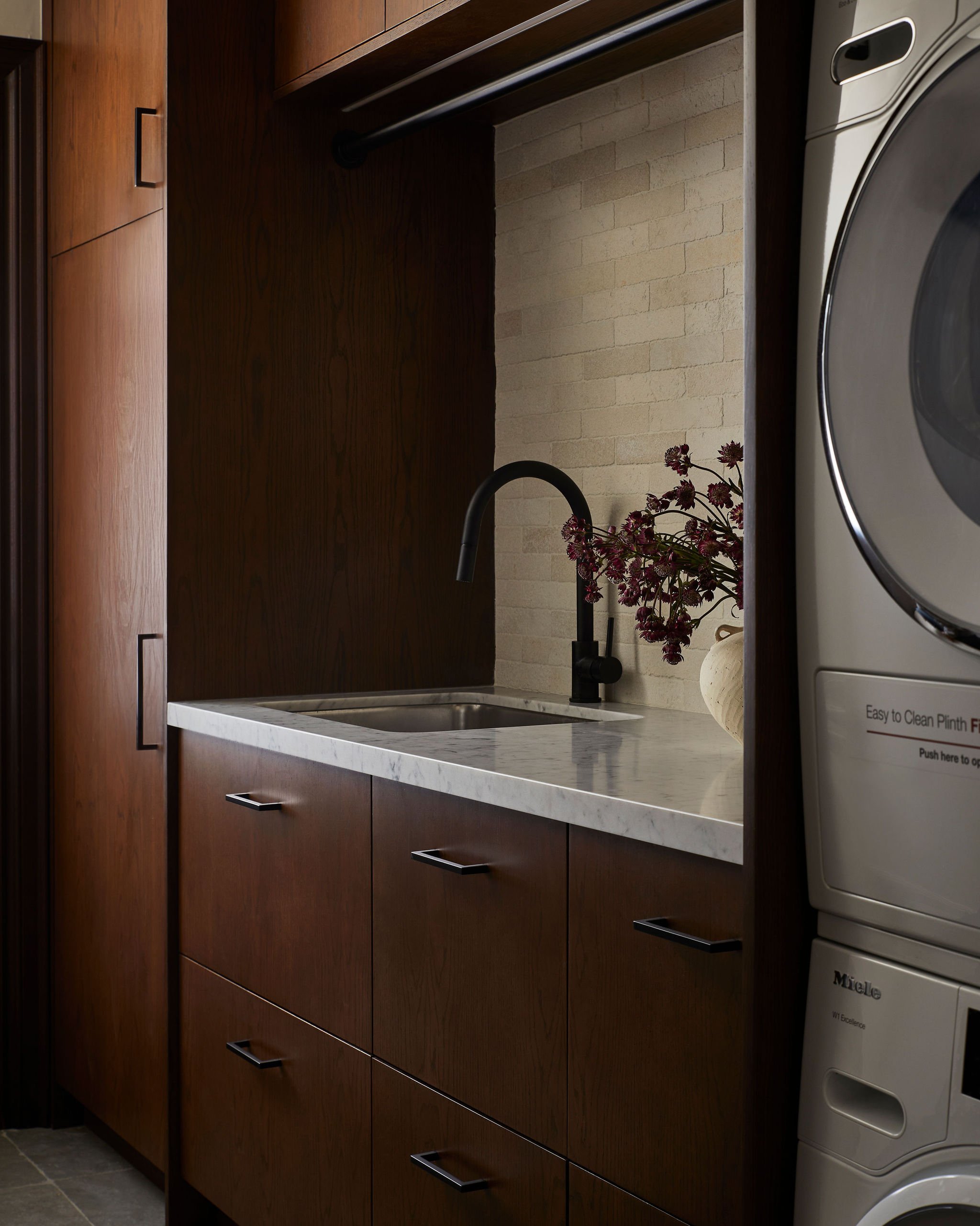 unionville-laundry-room-walnut-cabinets-marble-counter-megan-crosbie-design.jpg