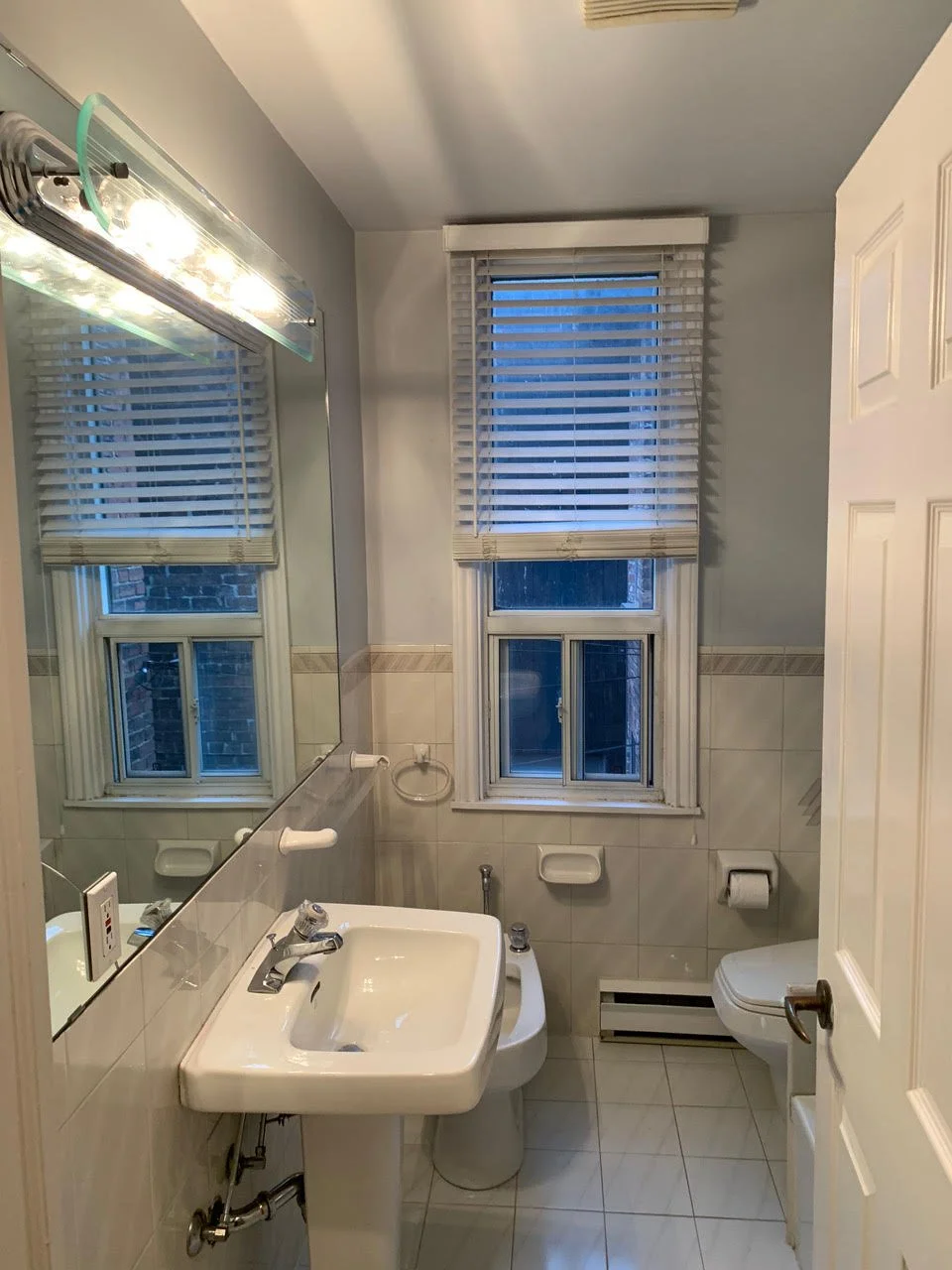 Original guest bathroom before renovation, Grace Street Victorian home Toronto