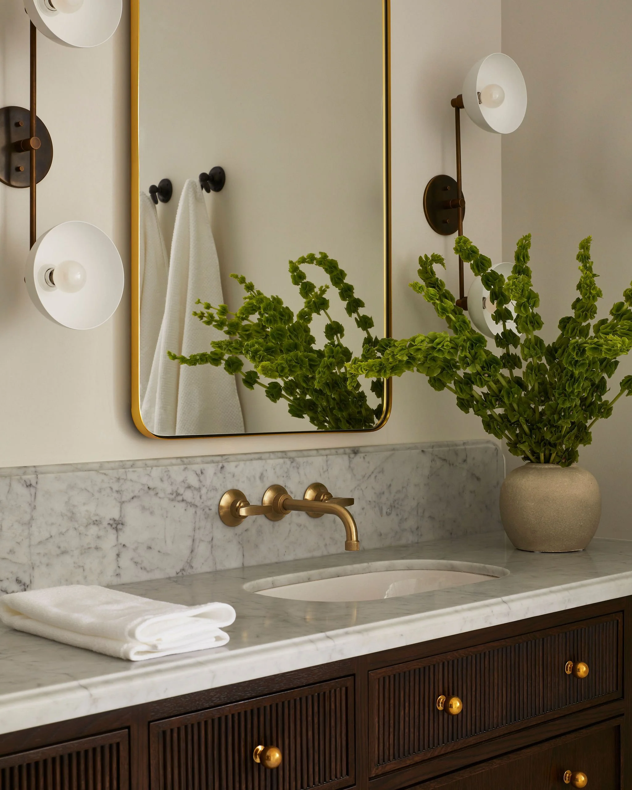 unionville-primary-bathroom-vanity-carrara-marble-brass-megan-crosbie-design.jpg